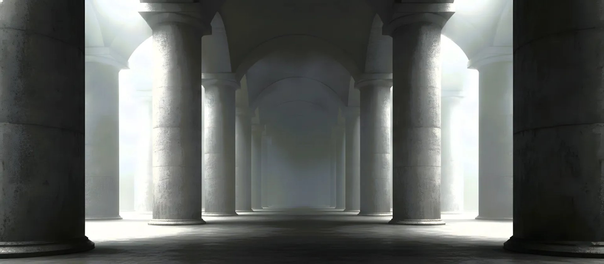Massive concrete pillars and arched ceilings inside the misty Lincoln Memorial Undercroft in Washington DC.
