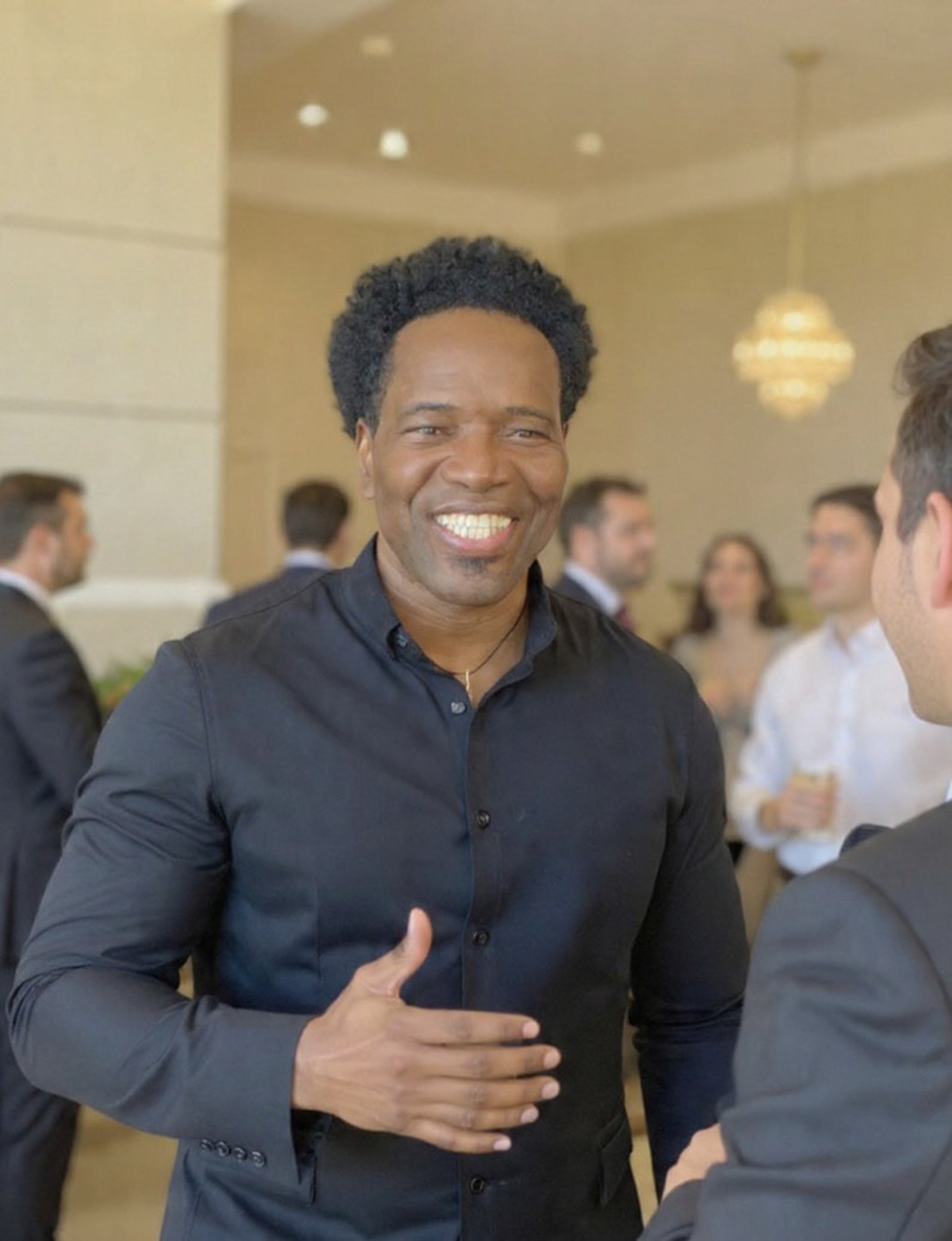 woman wearing yellow long-sleeved dress under white clouds and blue sky during daytime