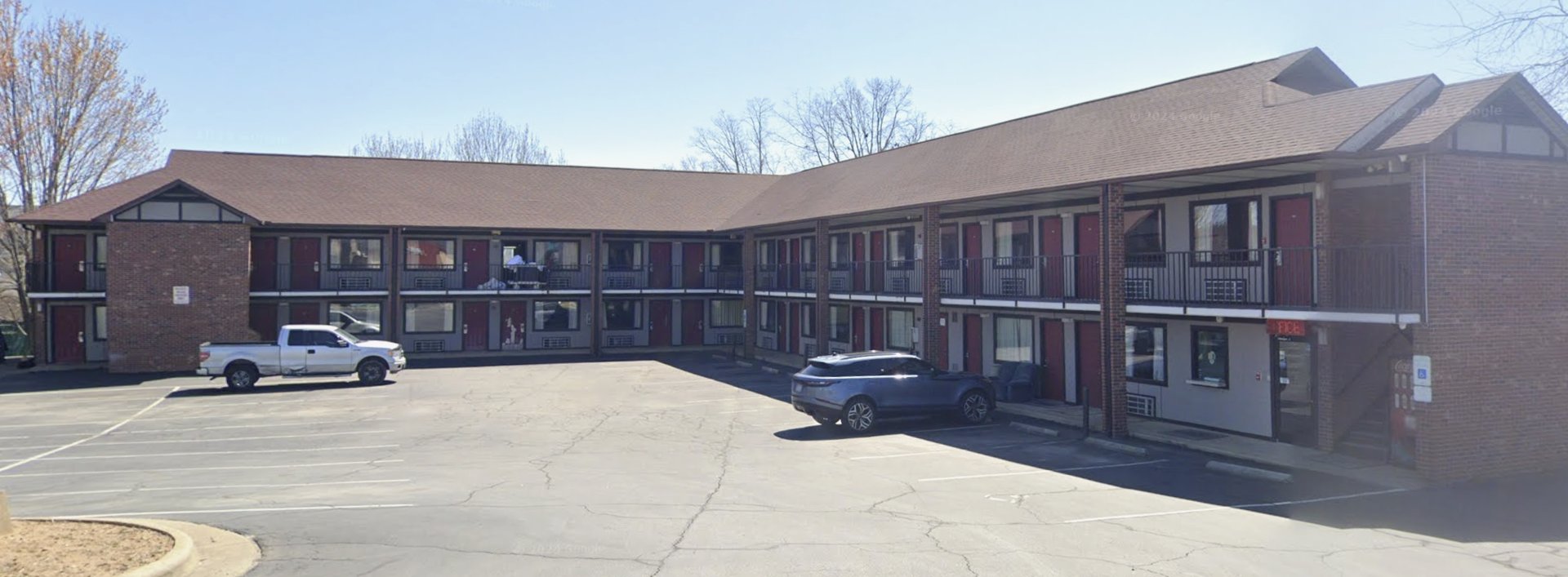 woman wearing yellow long-sleeved dress under white clouds and blue sky during daytime