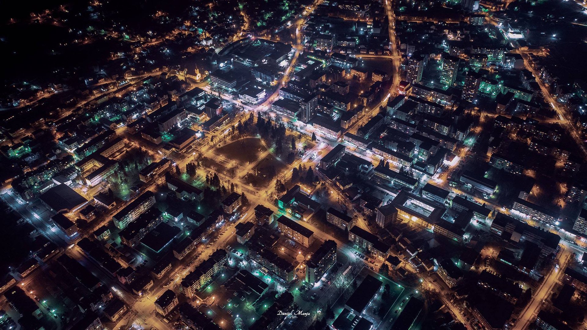 a close up of a black and brown abstract painting
