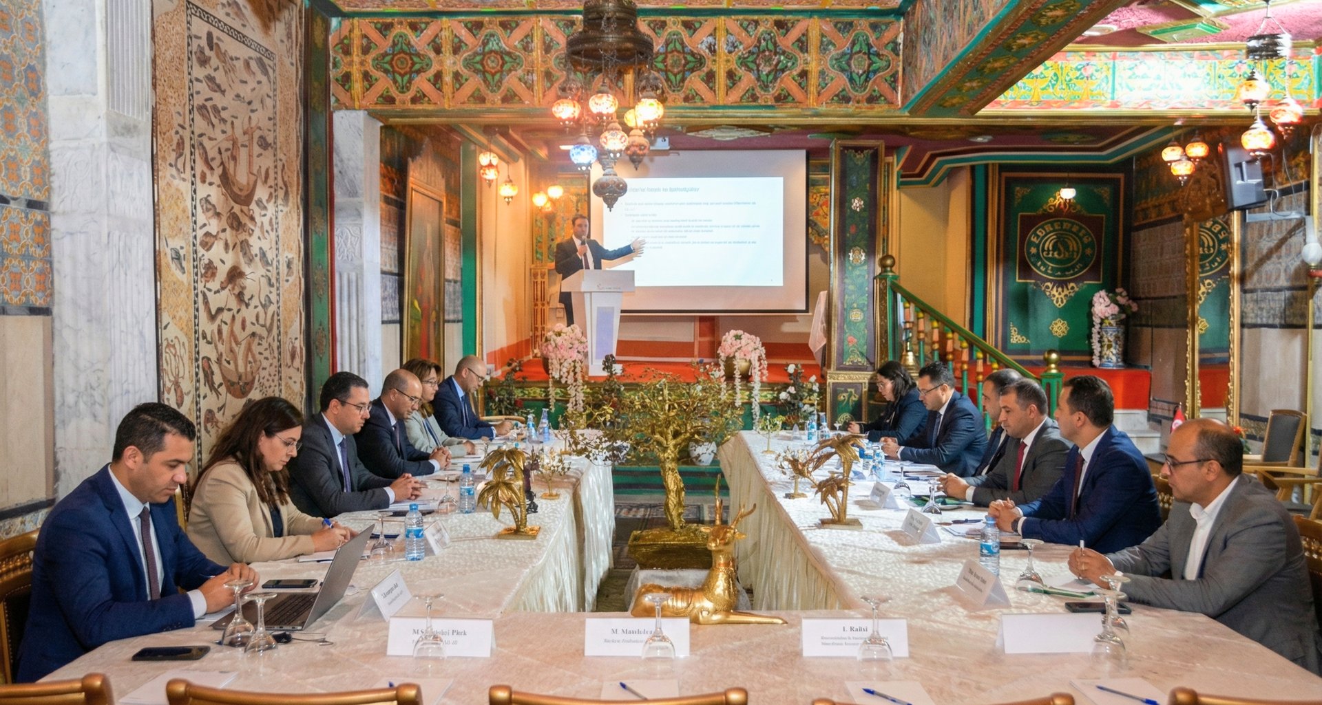 an abstract photo of a curved building with a blue sky in the background