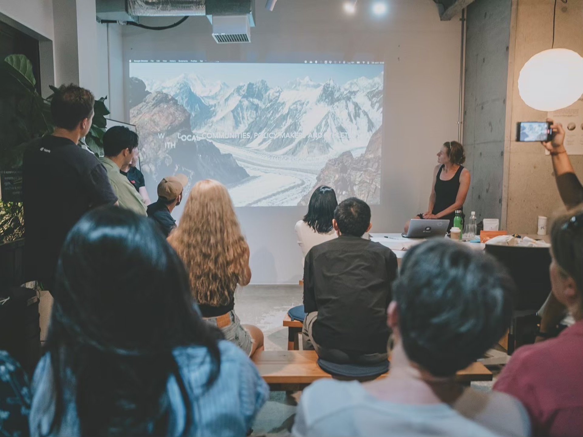 snow covered mountains near lake during daytime