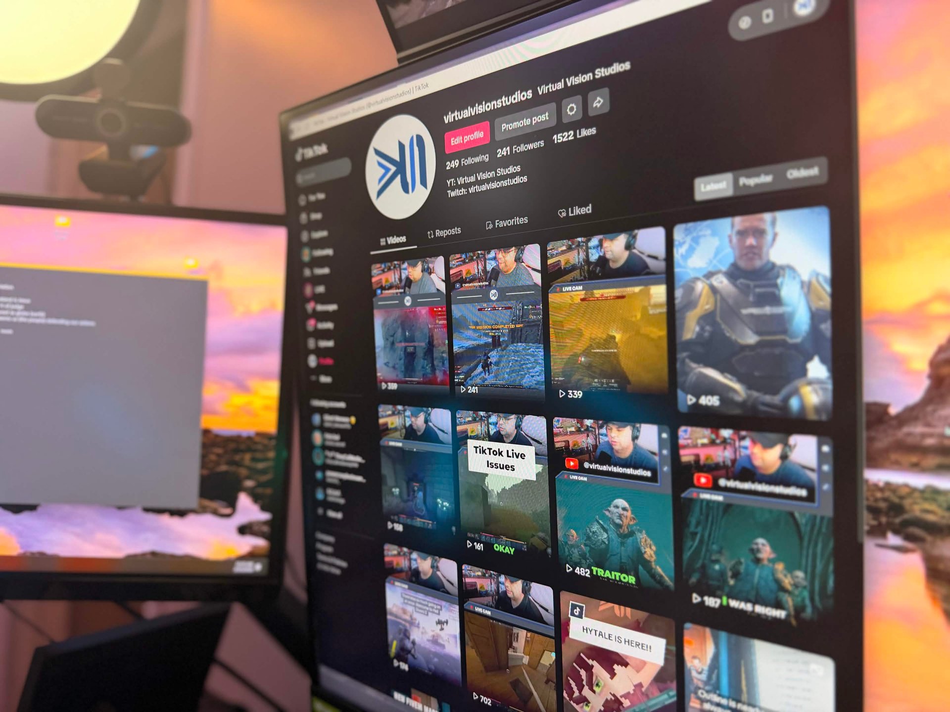 a laptop computer sitting on top of a white table