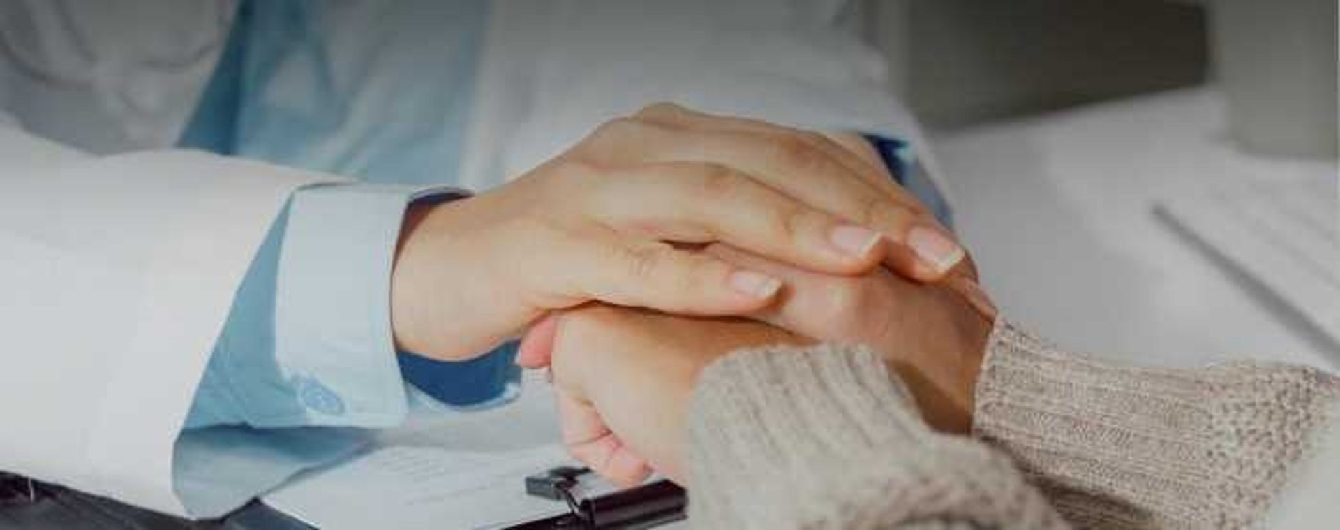 an abstract photo of a curved building with a blue sky in the background