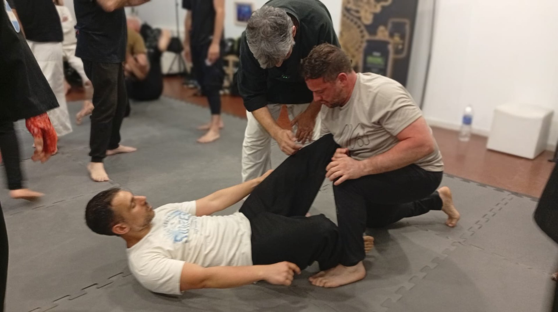 an abstract photo of a curved building with a blue sky in the background