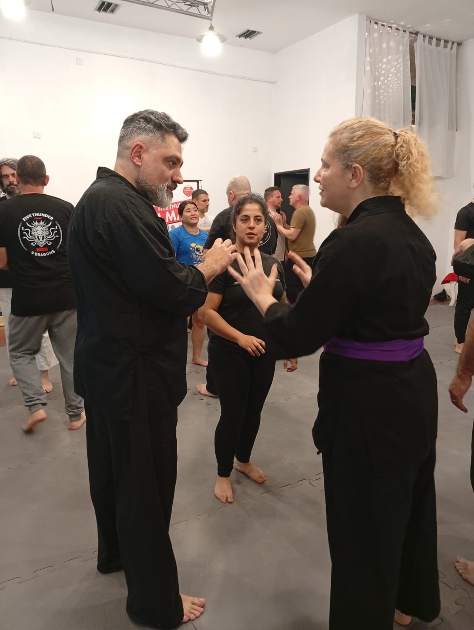 an abstract photo of a curved building with a blue sky in the background
