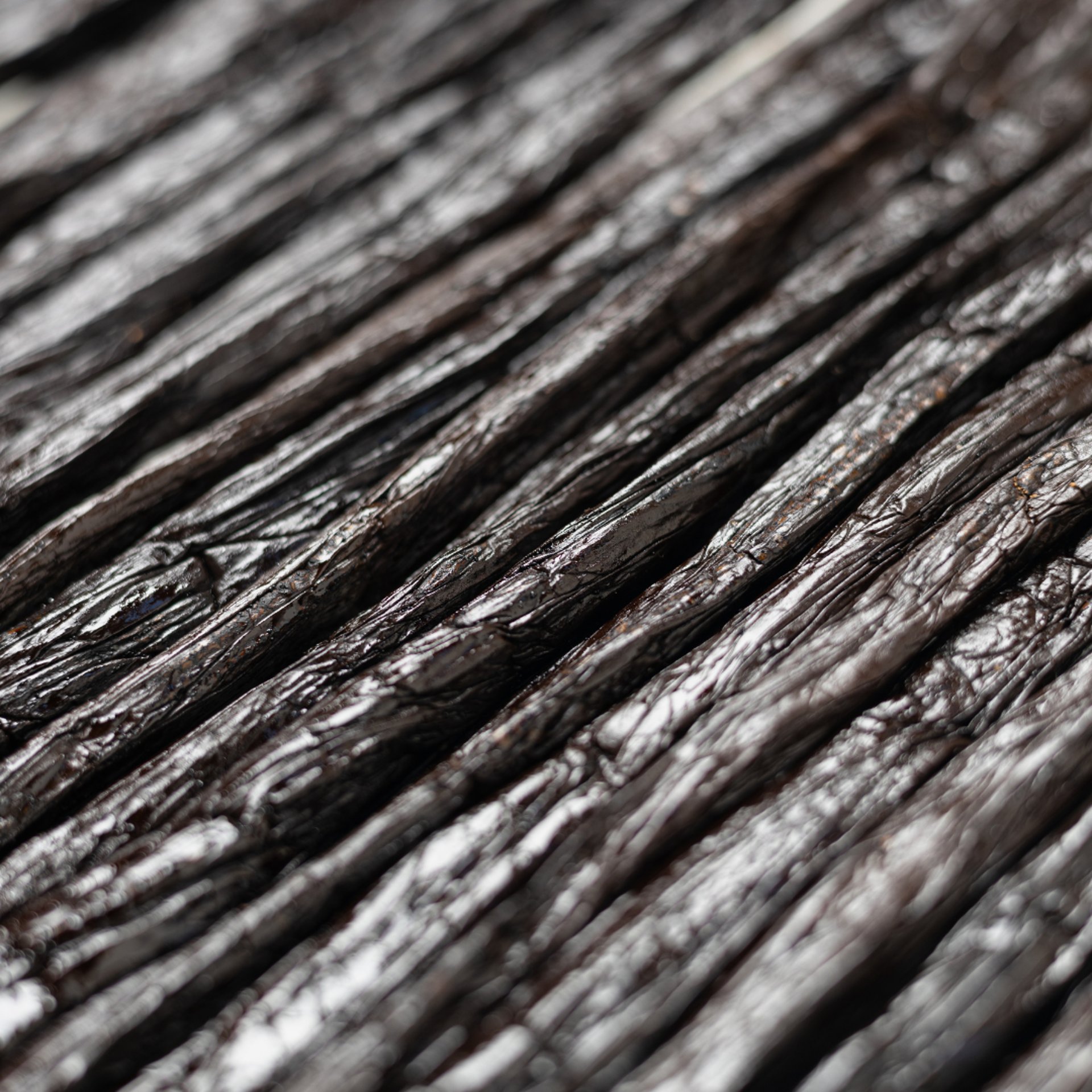 an abstract photo of a curved building with a blue sky in the background