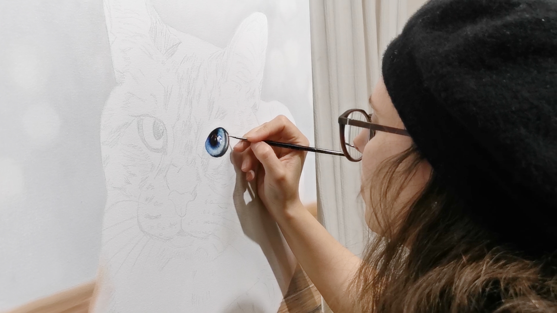an abstract photo of a curved building with a blue sky in the background