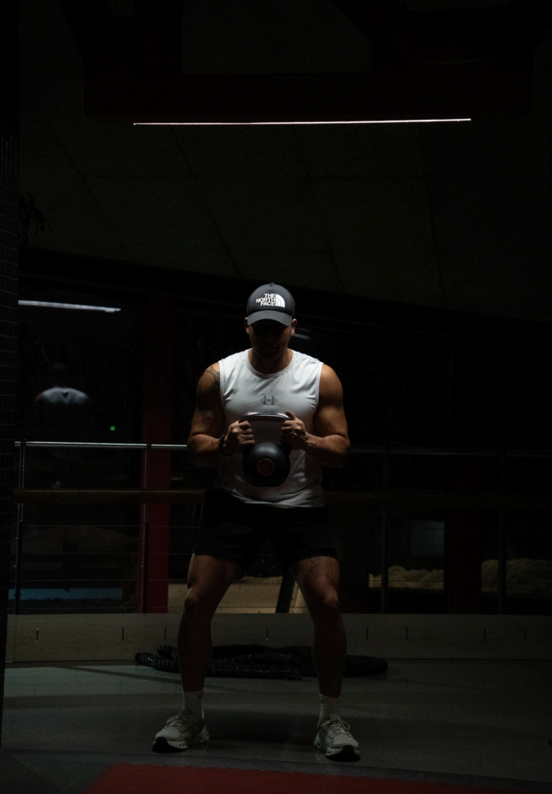 black and brown leather padded tub sofa