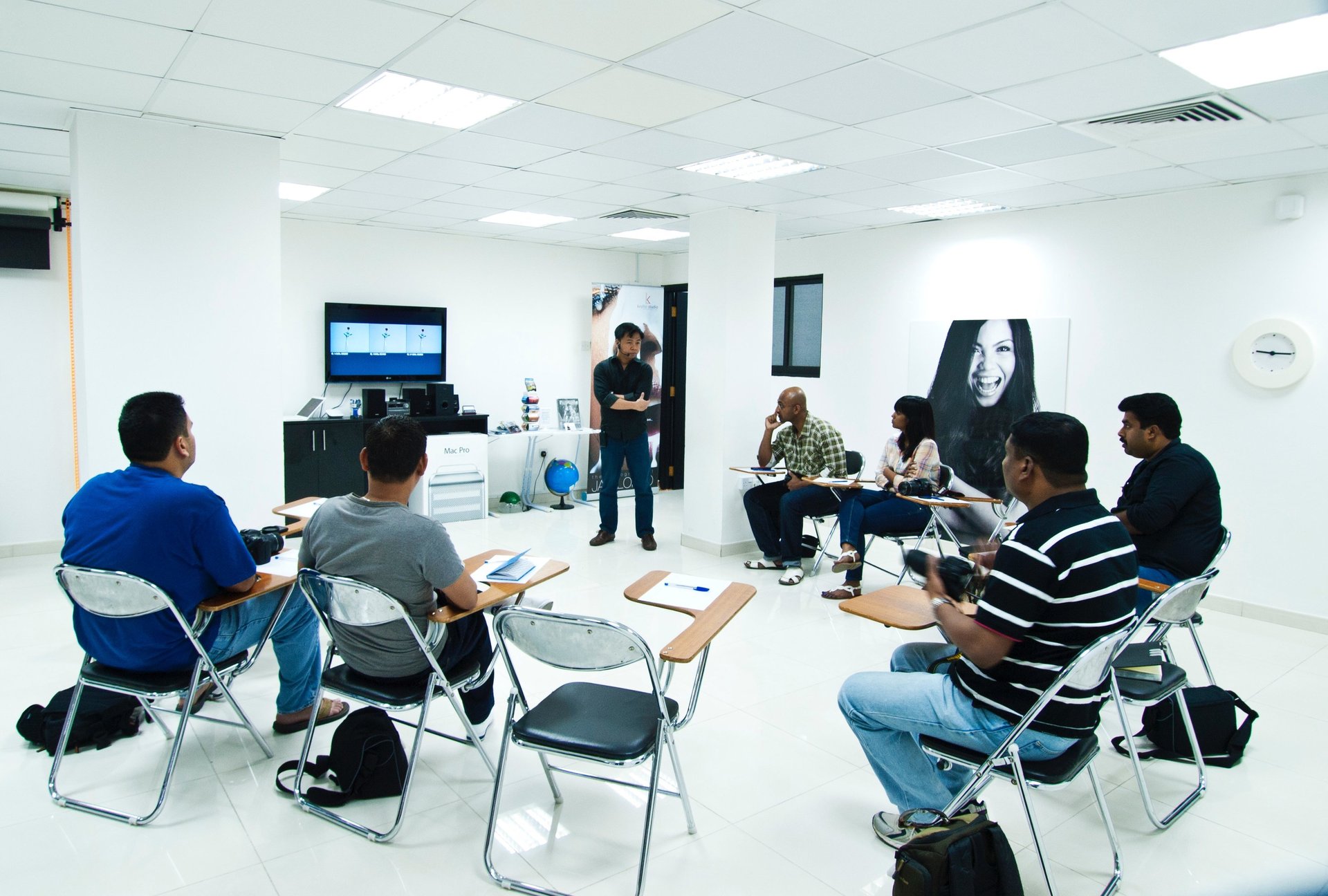 an abstract photo of a curved building with a blue sky in the background