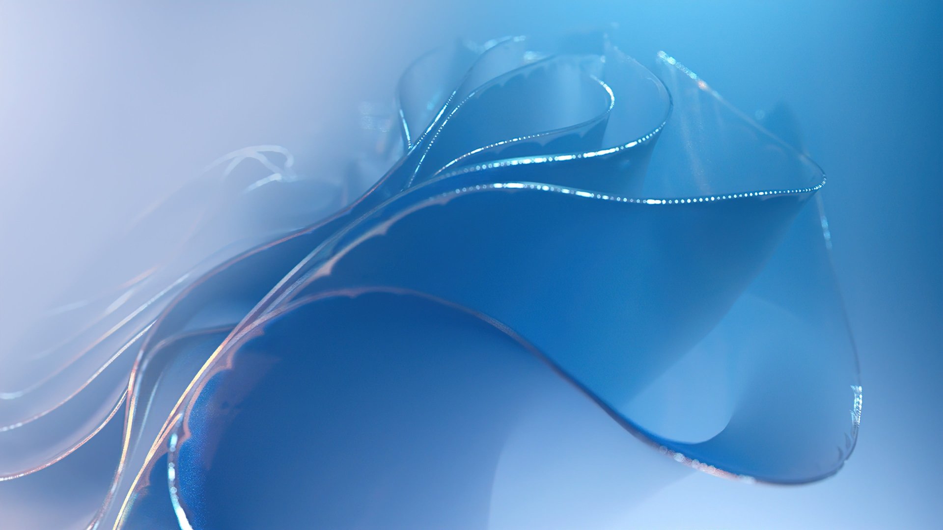 an abstract photo of a curved building with a blue sky in the background