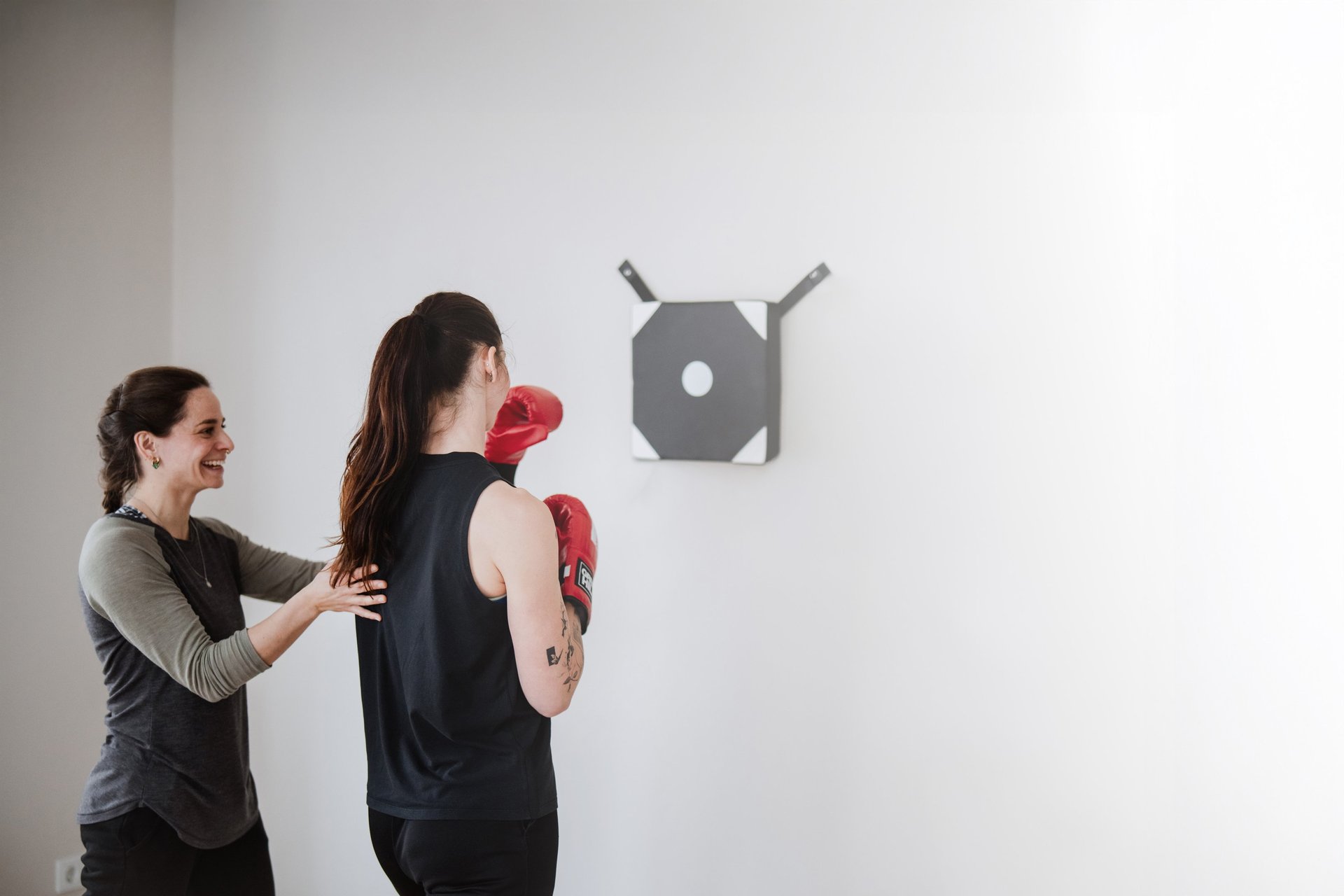 an abstract photo of a curved building with a blue sky in the background