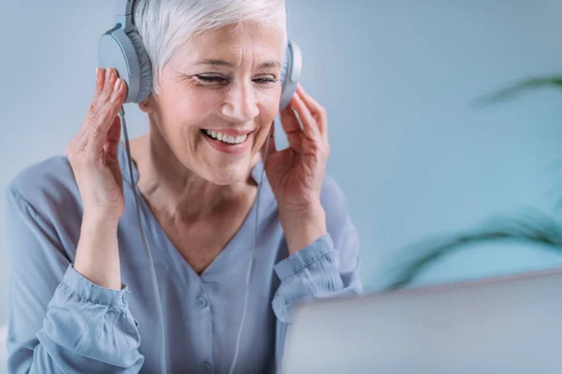 person writing on white paper