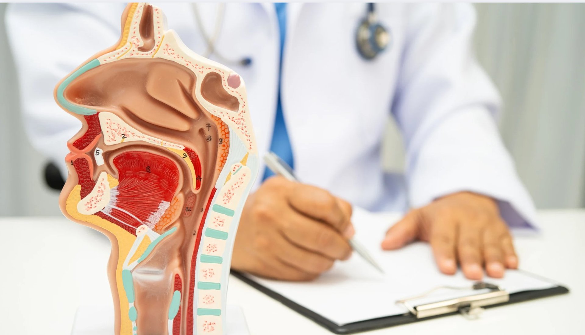 person writing on white paper