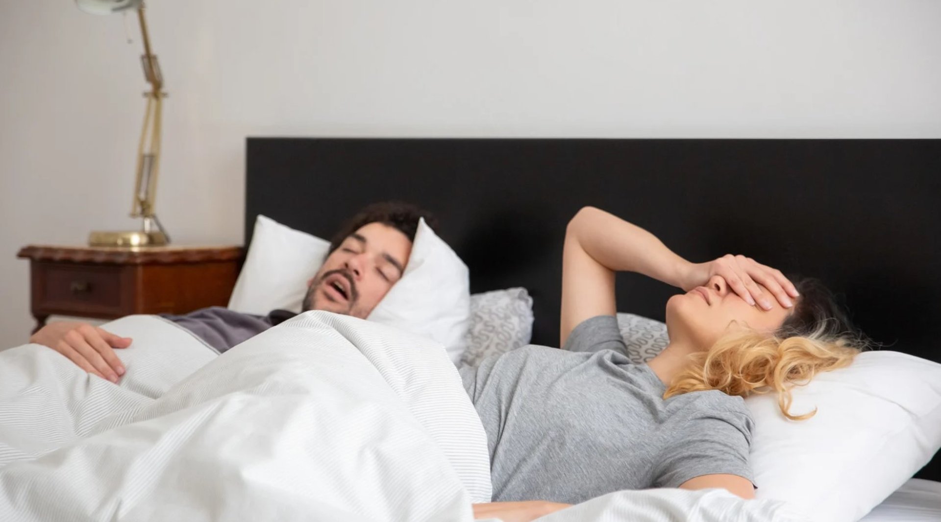 person writing on white paper