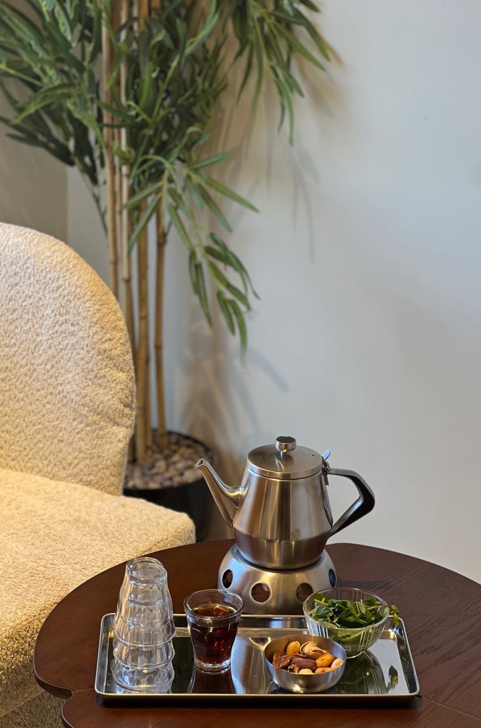 seven different spices and herbs on gray stainless steel spoons