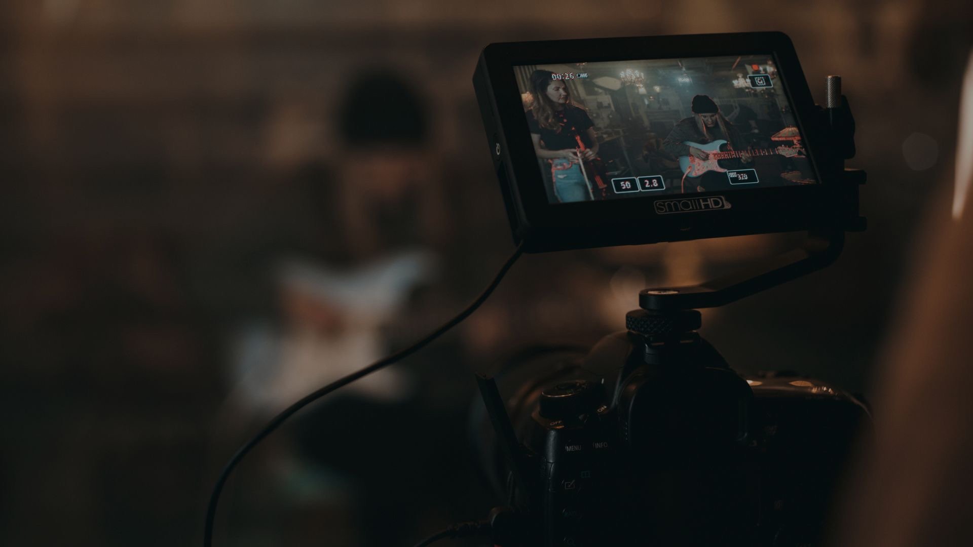 person holding clapperboard