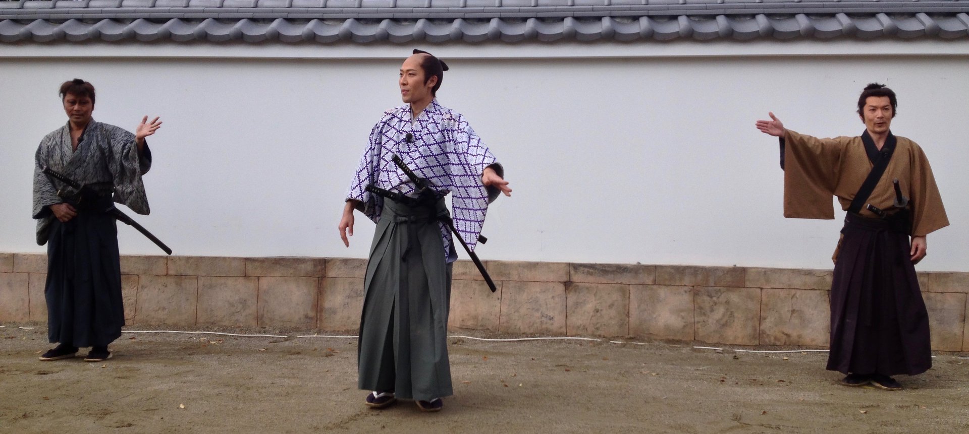 black and brown leather padded tub sofa