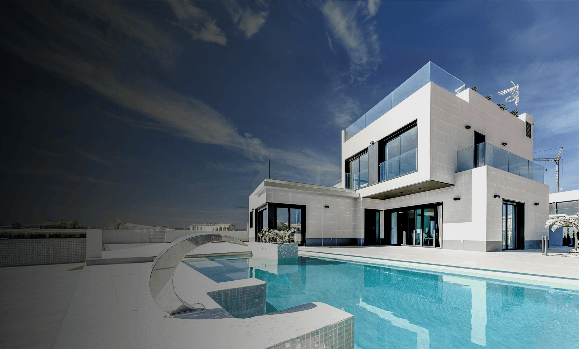 white concrete building under blue sky during daytime