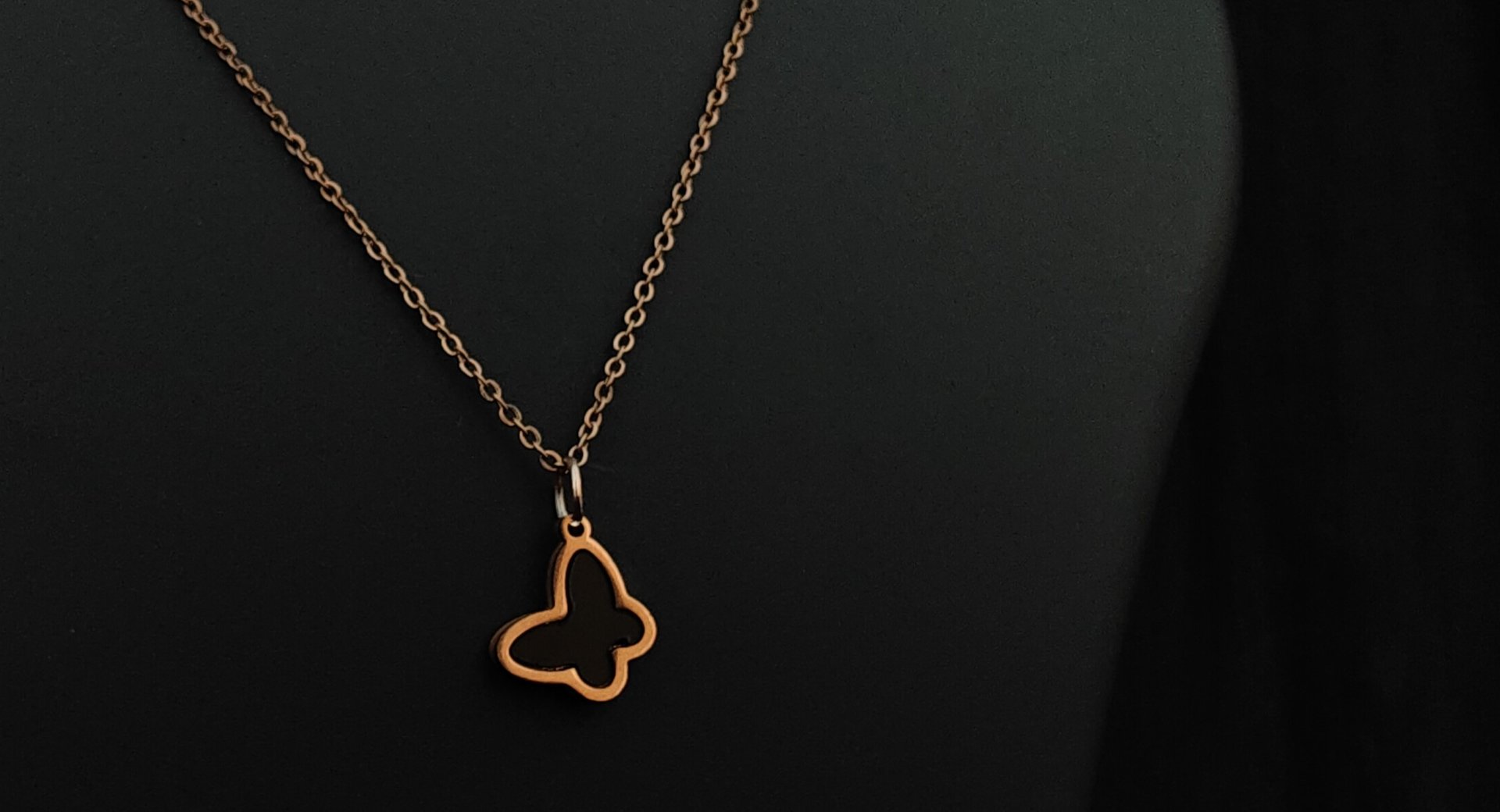 a close up of a black and brown abstract painting