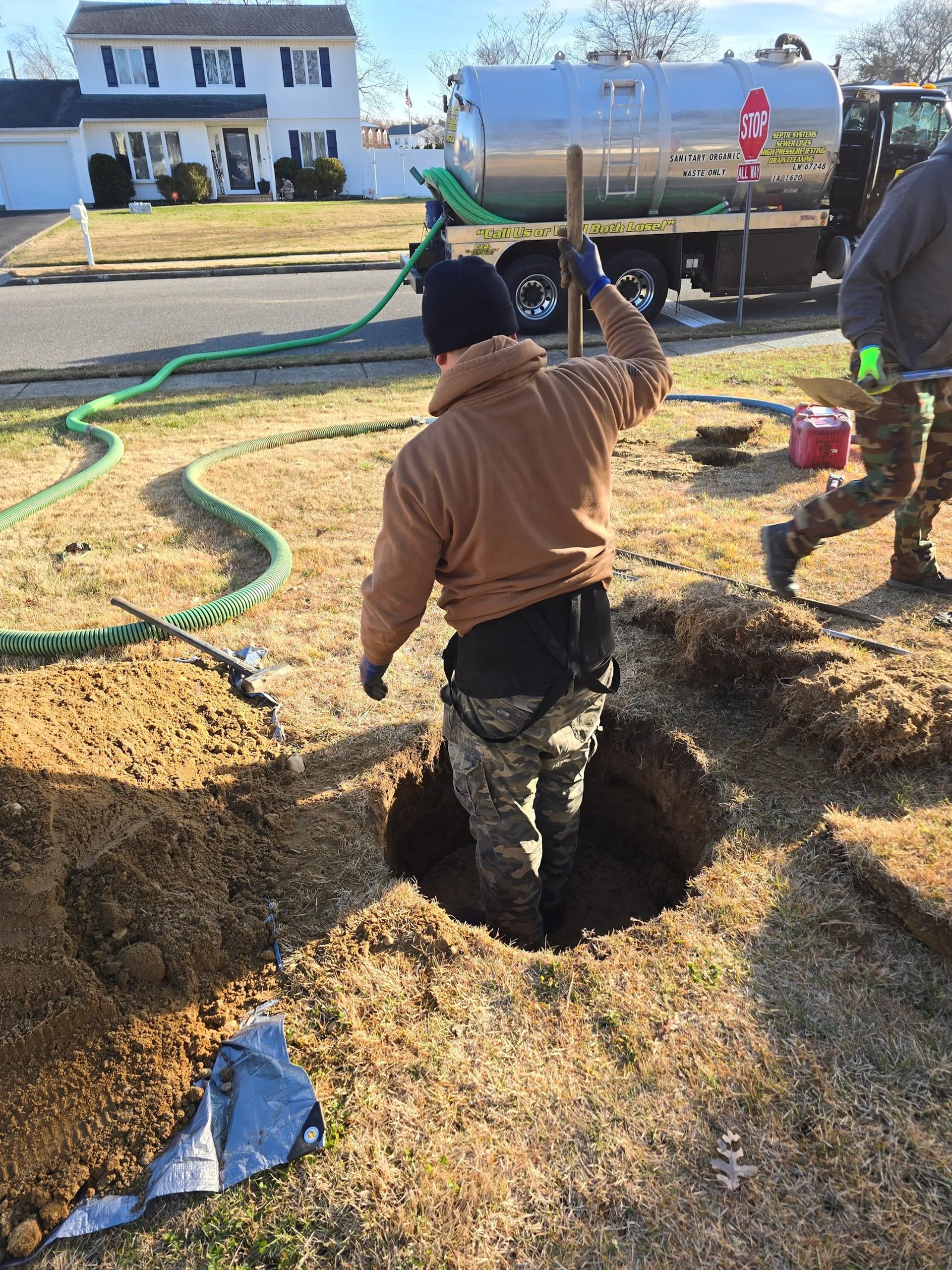 black and brown leather padded tub sofa