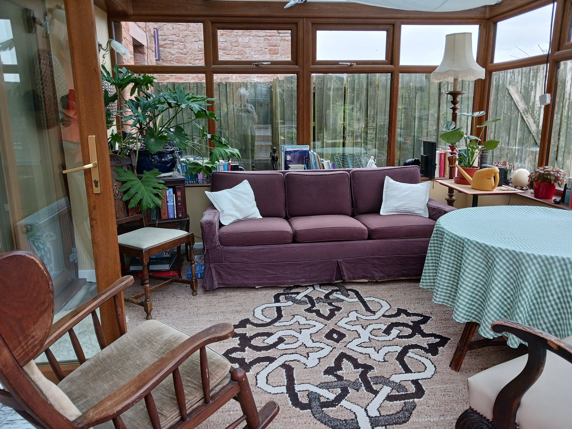 woman wearing yellow long-sleeved dress under white clouds and blue sky during daytime