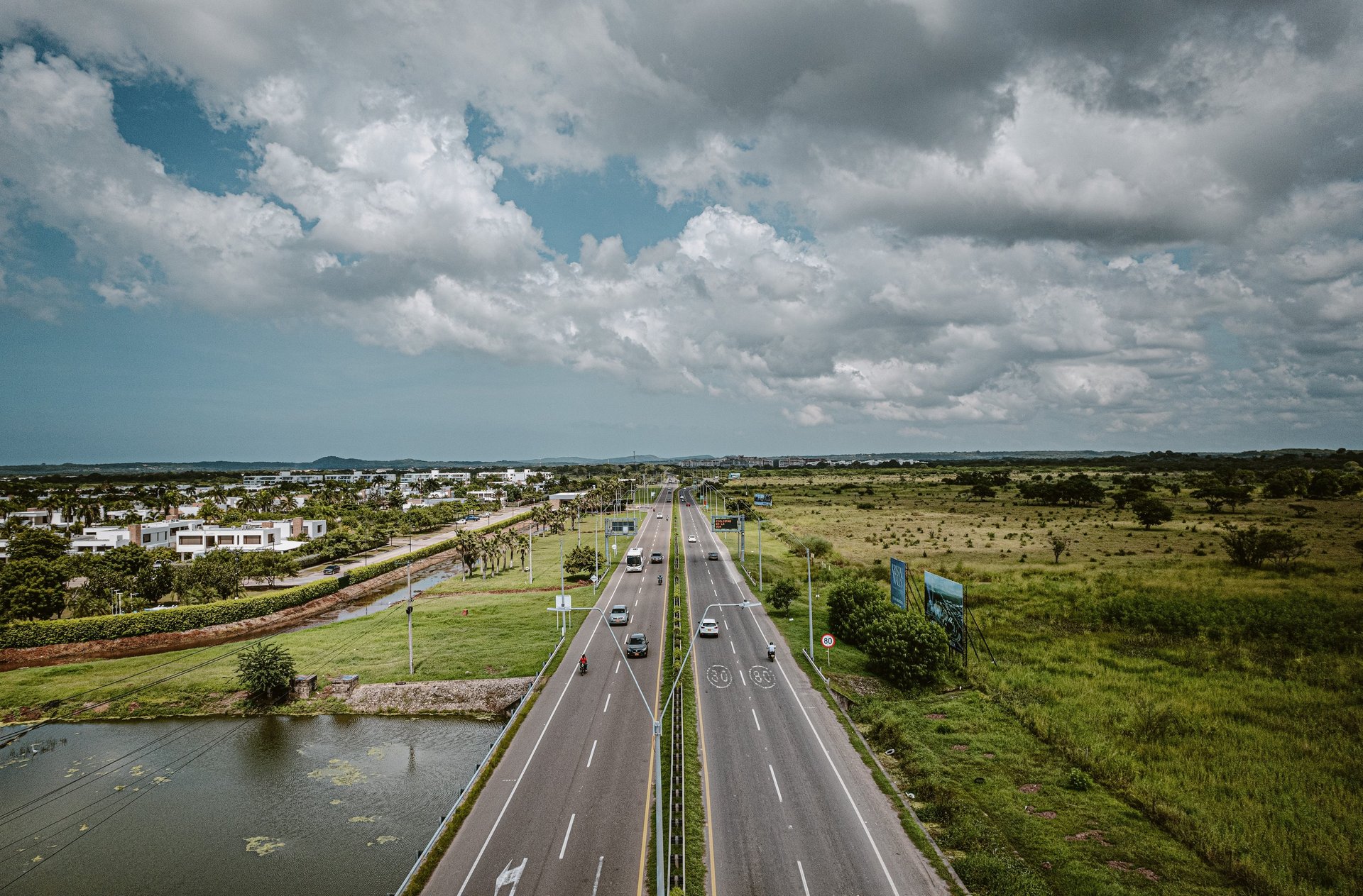 an abstract photo of a curved building with a blue sky in the background