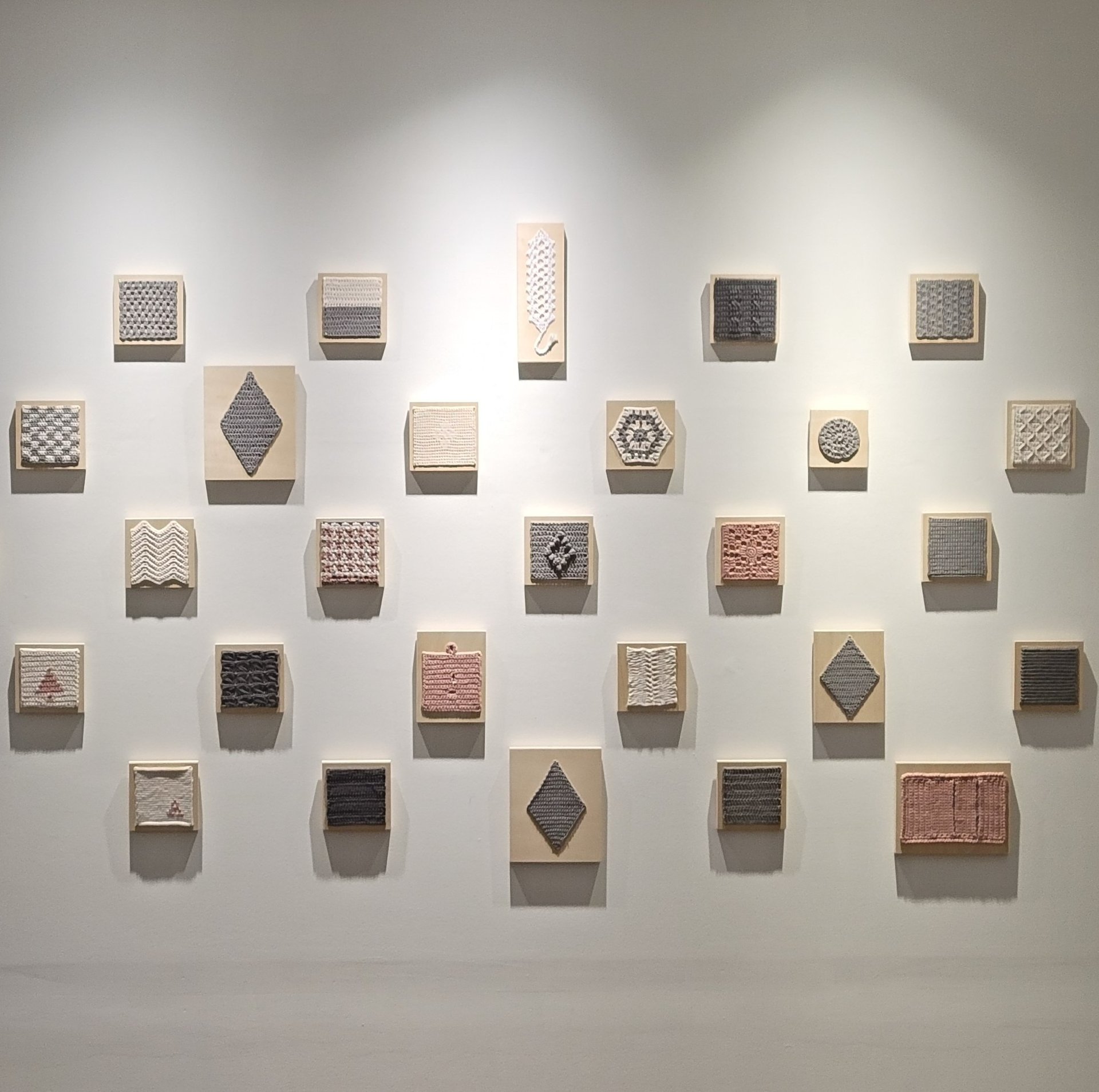 blue and yellow plastic tool on white textile