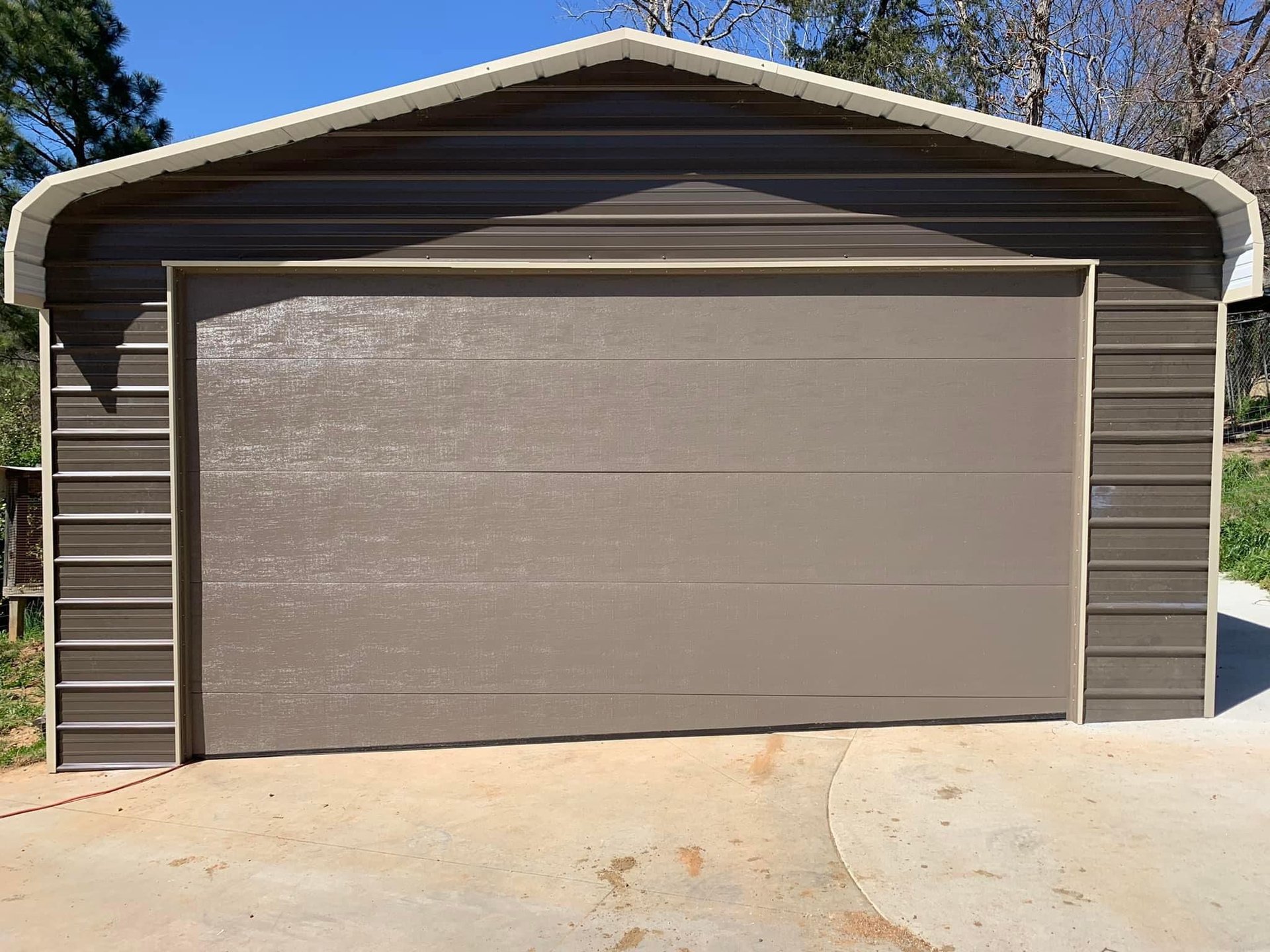 black and brown leather padded tub sofa