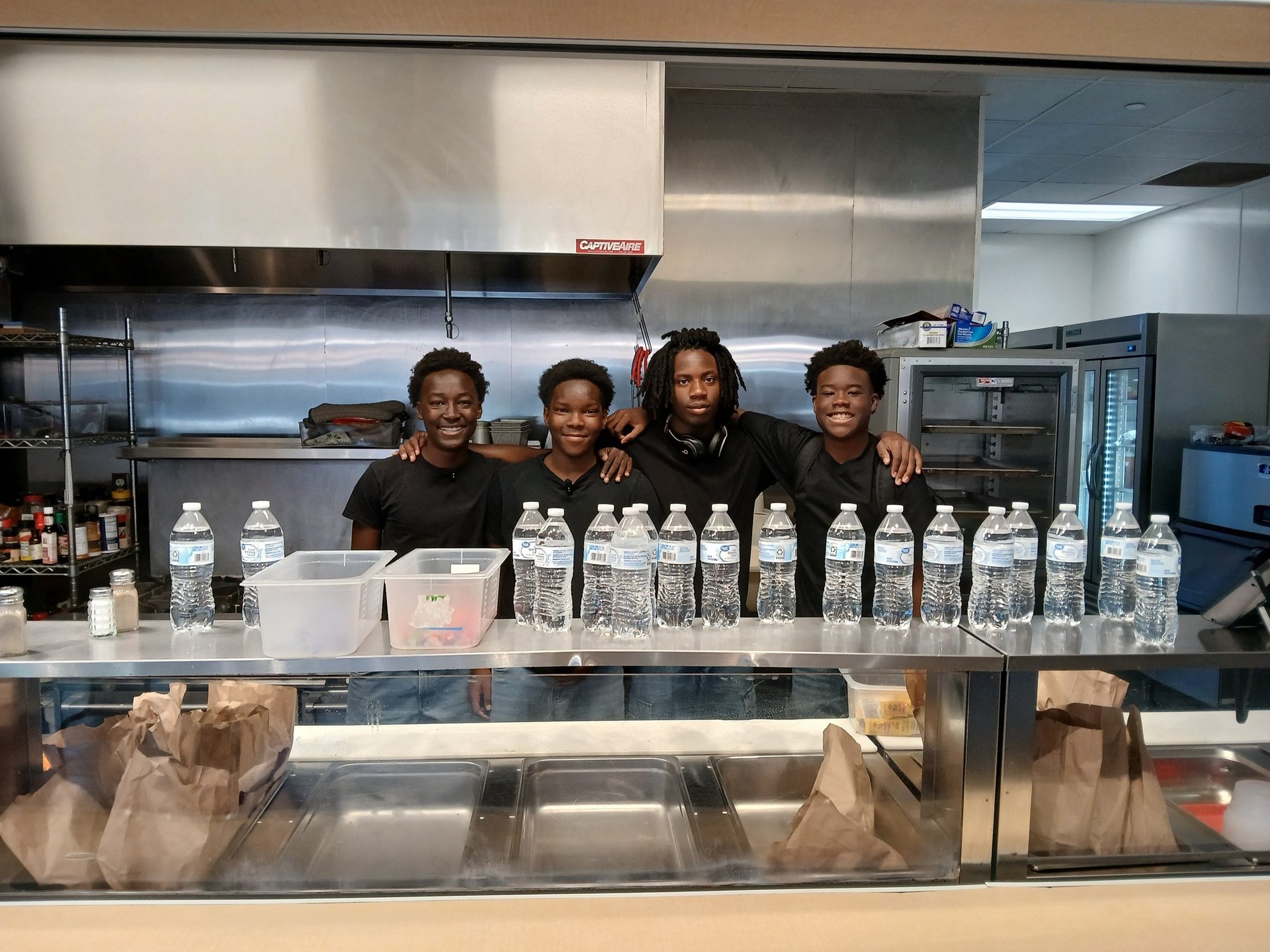 woman wearing yellow long-sleeved dress under white clouds and blue sky during daytime
