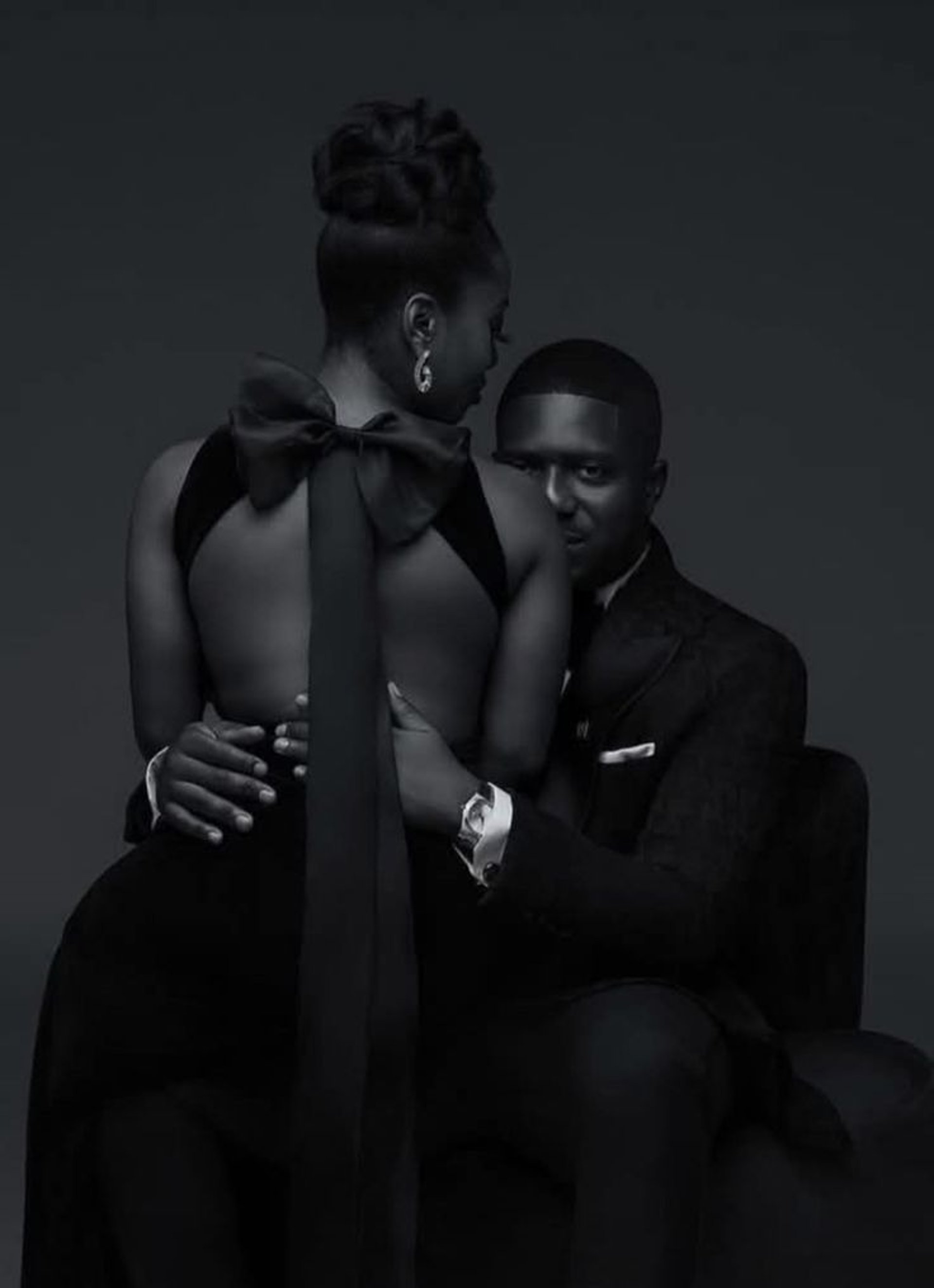 an abstract photo of a curved building with a blue sky in the background