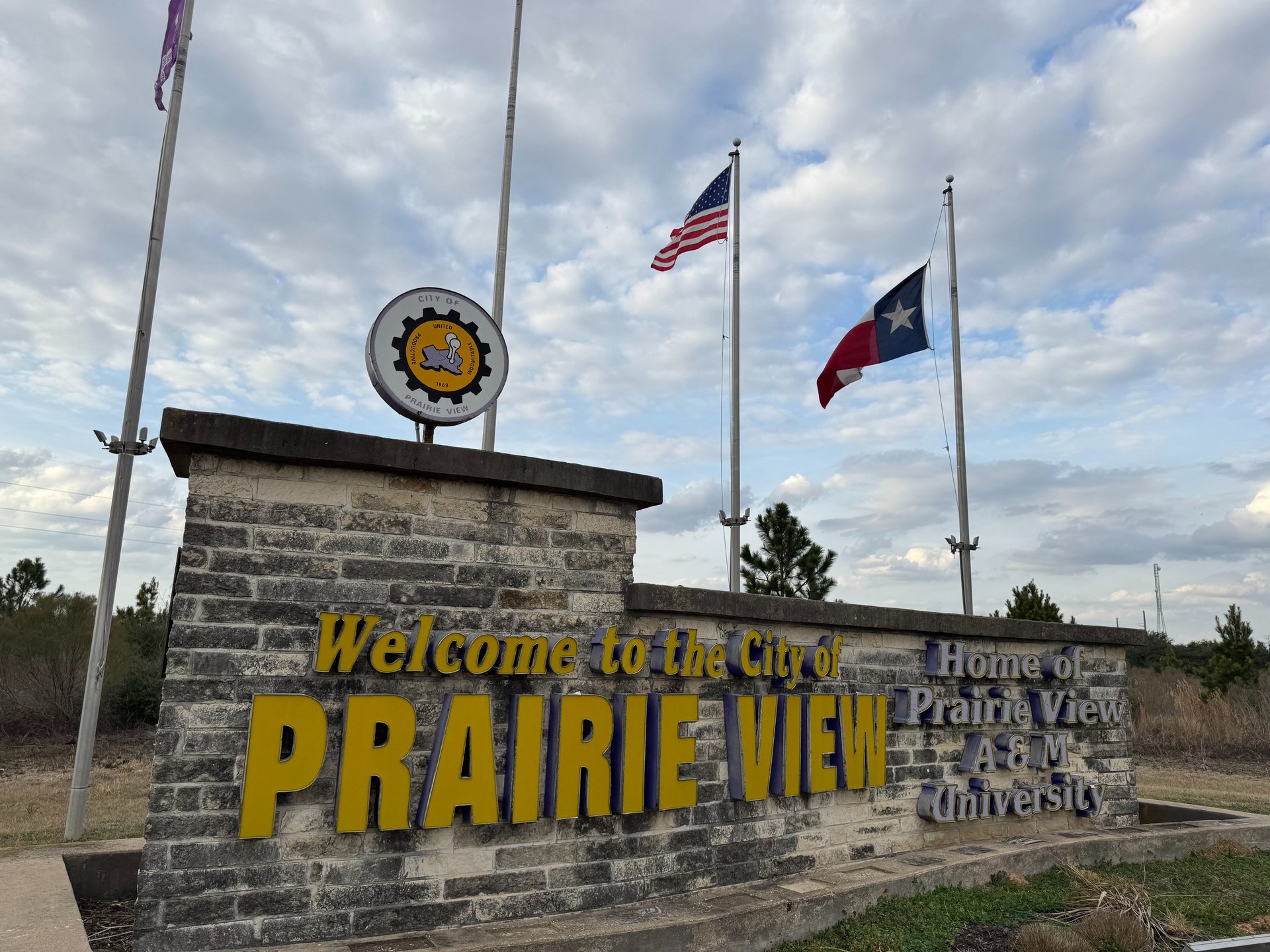 flag of U.S.A. under white clouds during daytime