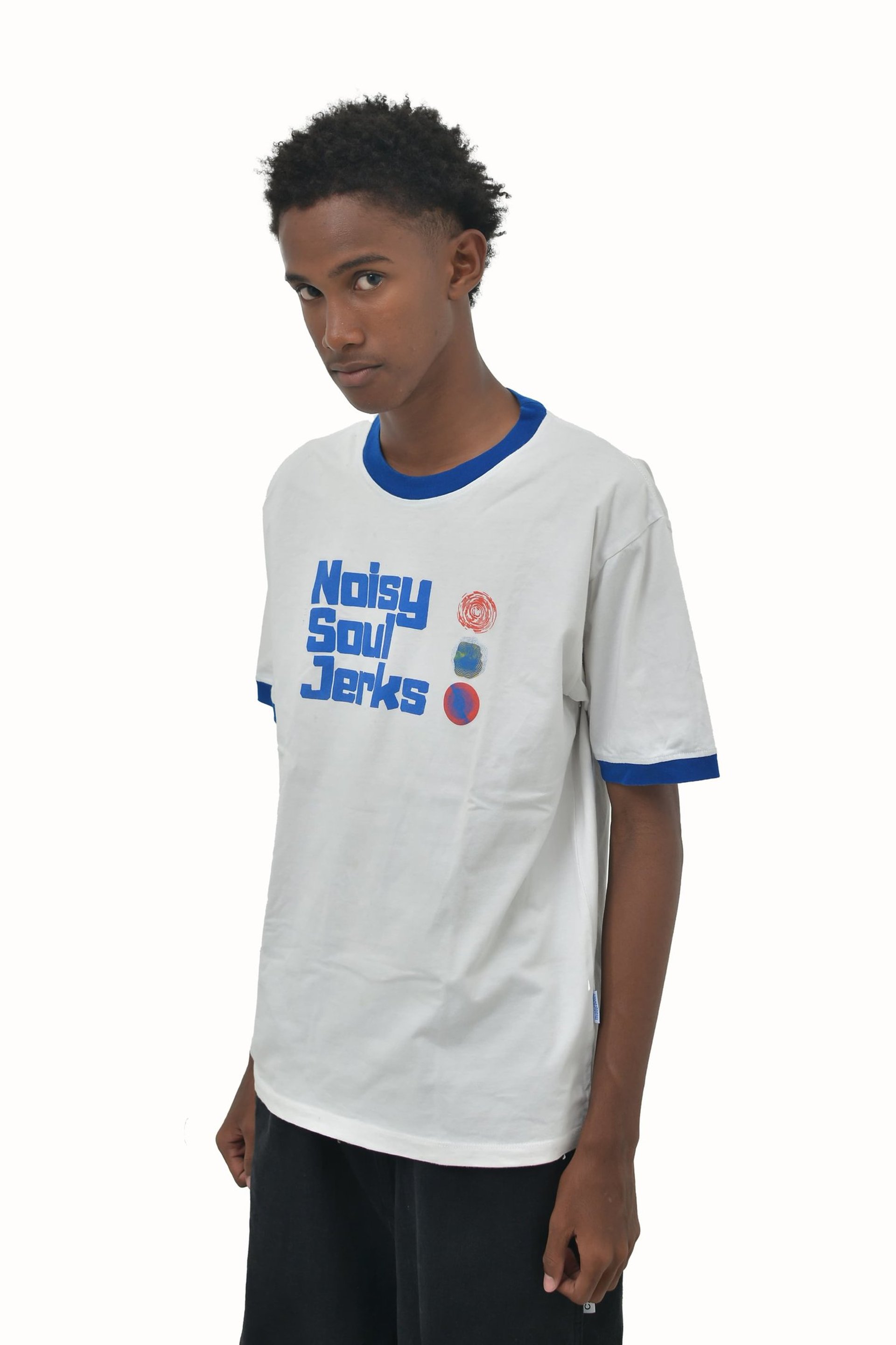 an abstract photo of a curved building with a blue sky in the background