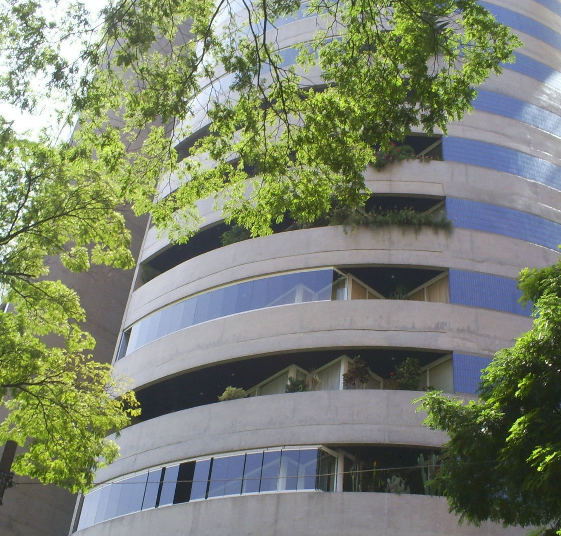 black and brown leather padded tub sofa