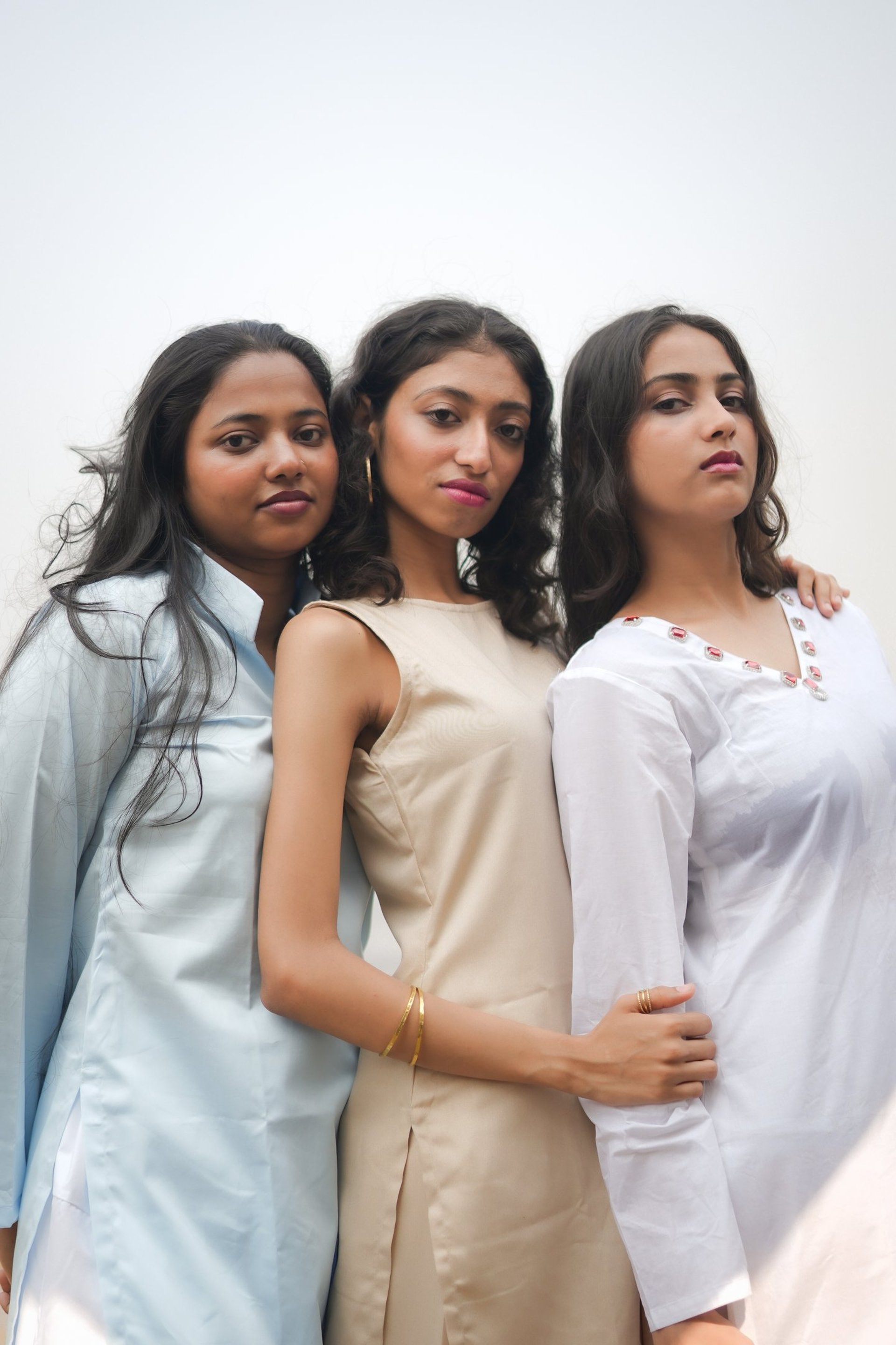 person wearing grey knit sweater