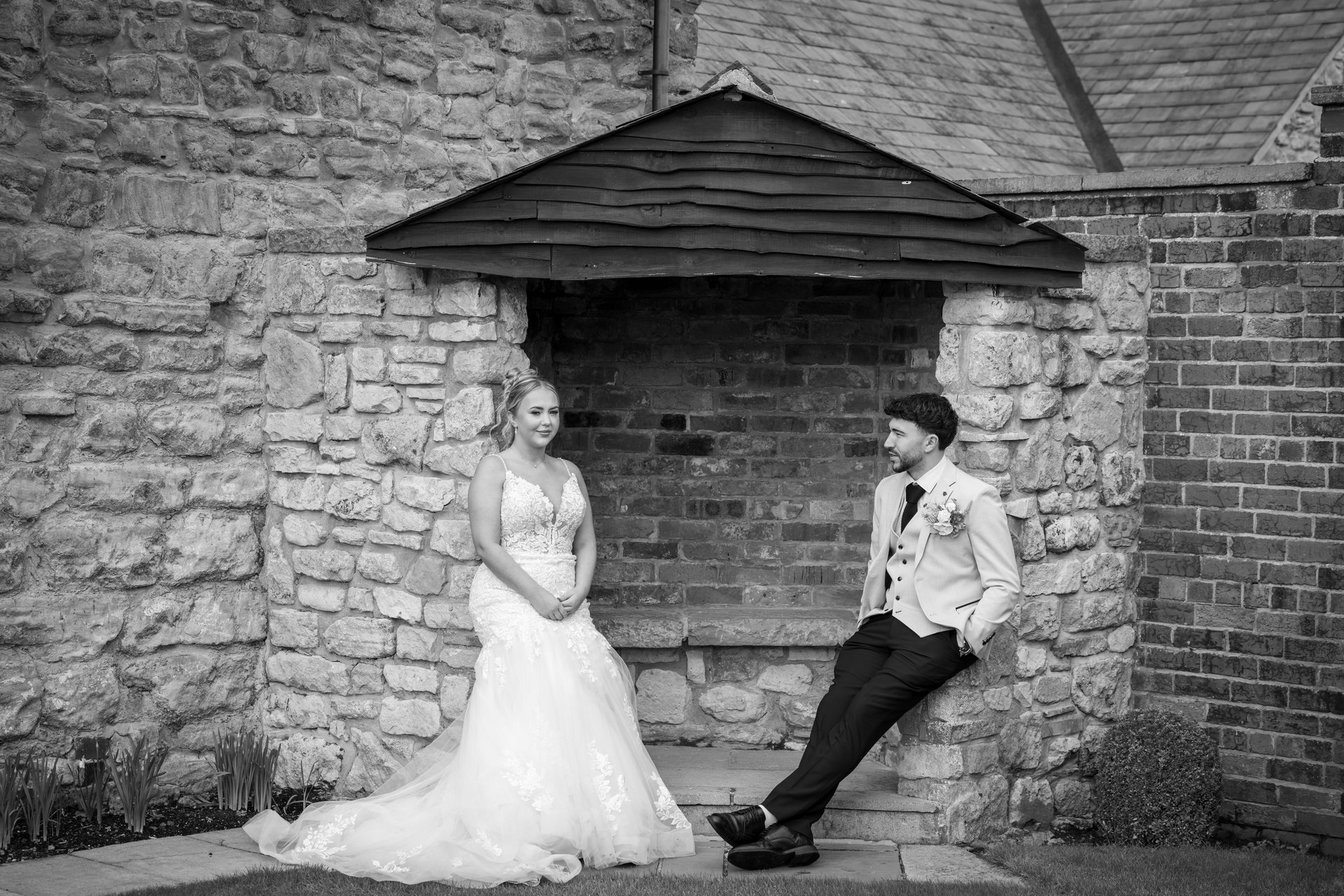 an abstract photo of a curved building with a blue sky in the background