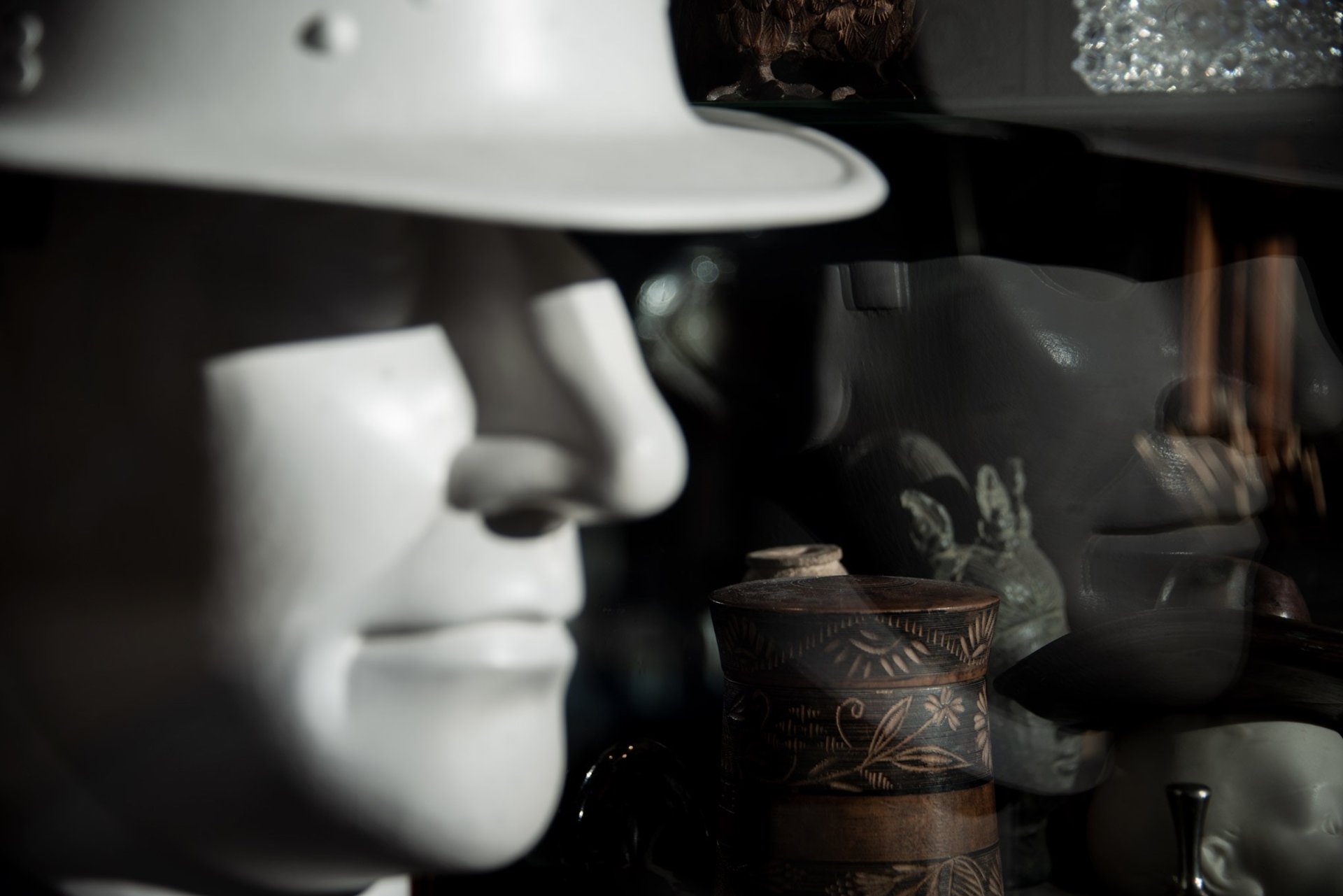 an abstract photo of a curved building with a blue sky in the background
