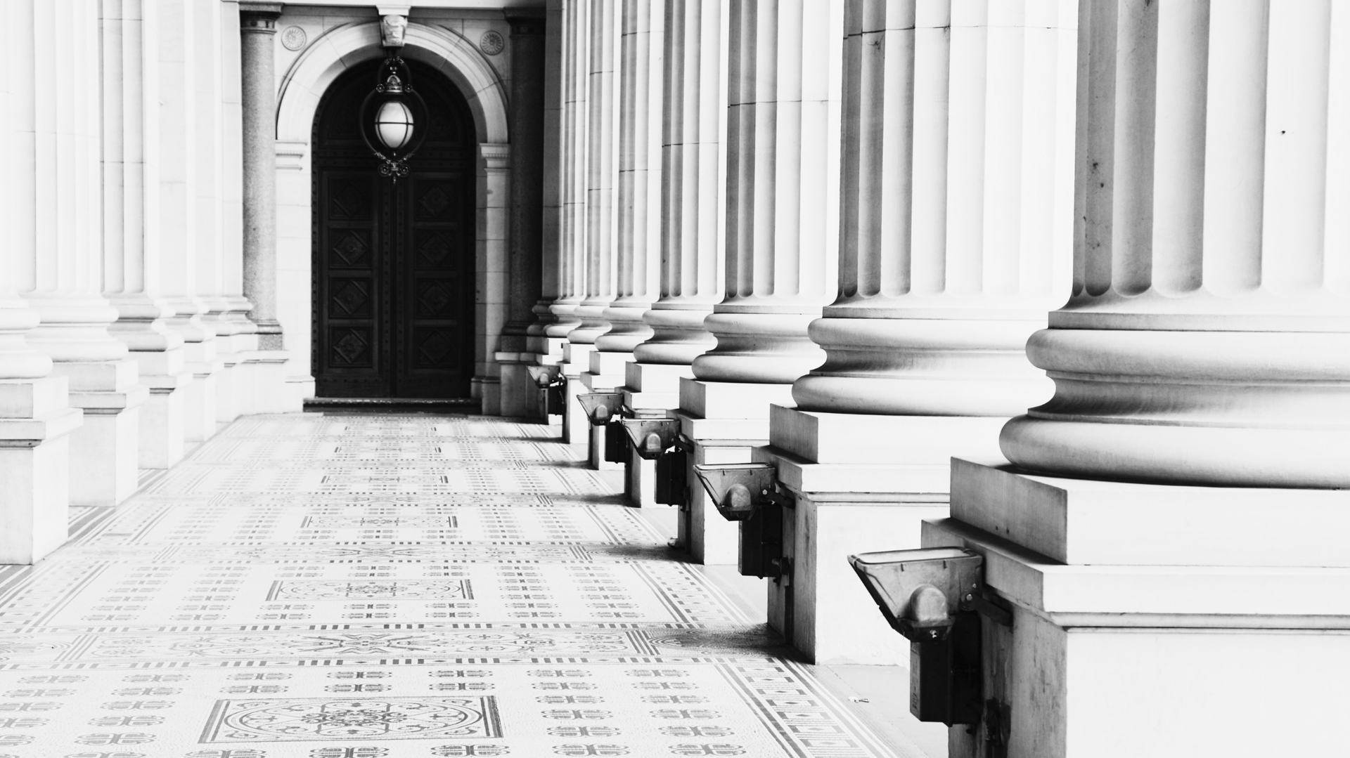 black and brown leather padded tub sofa