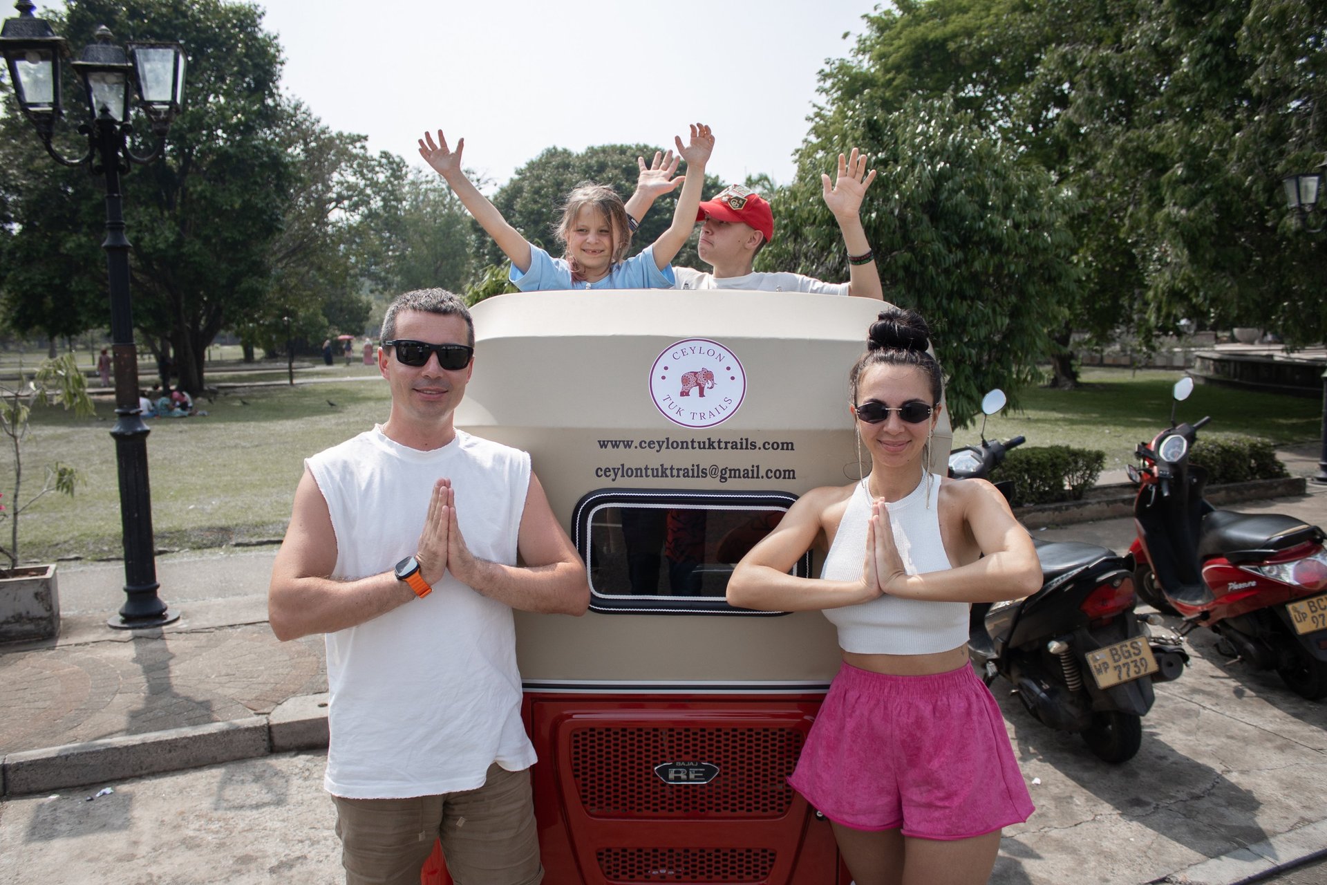 a man driving a bus down a street at night