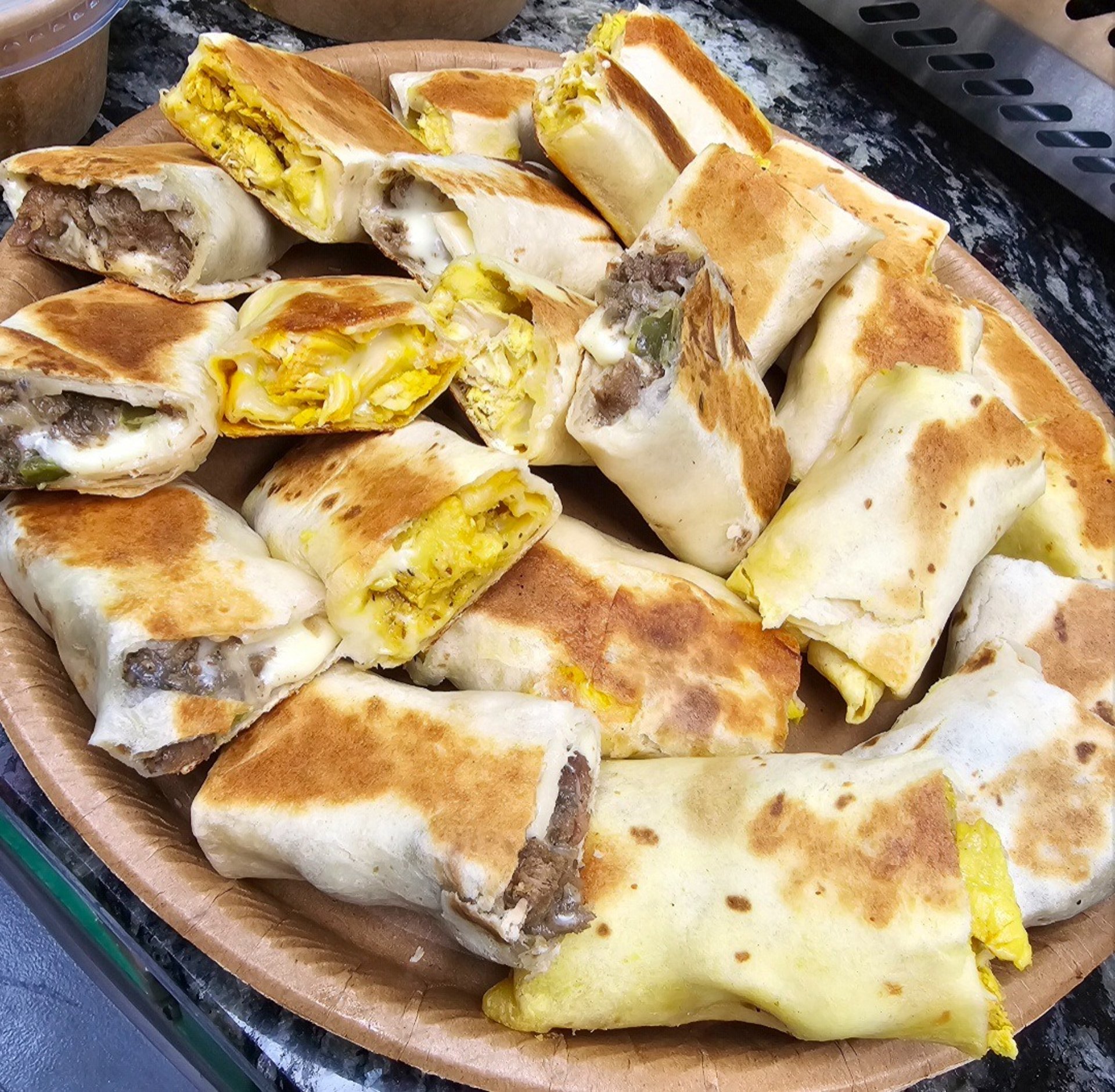 woman wearing yellow long-sleeved dress under white clouds and blue sky during daytime