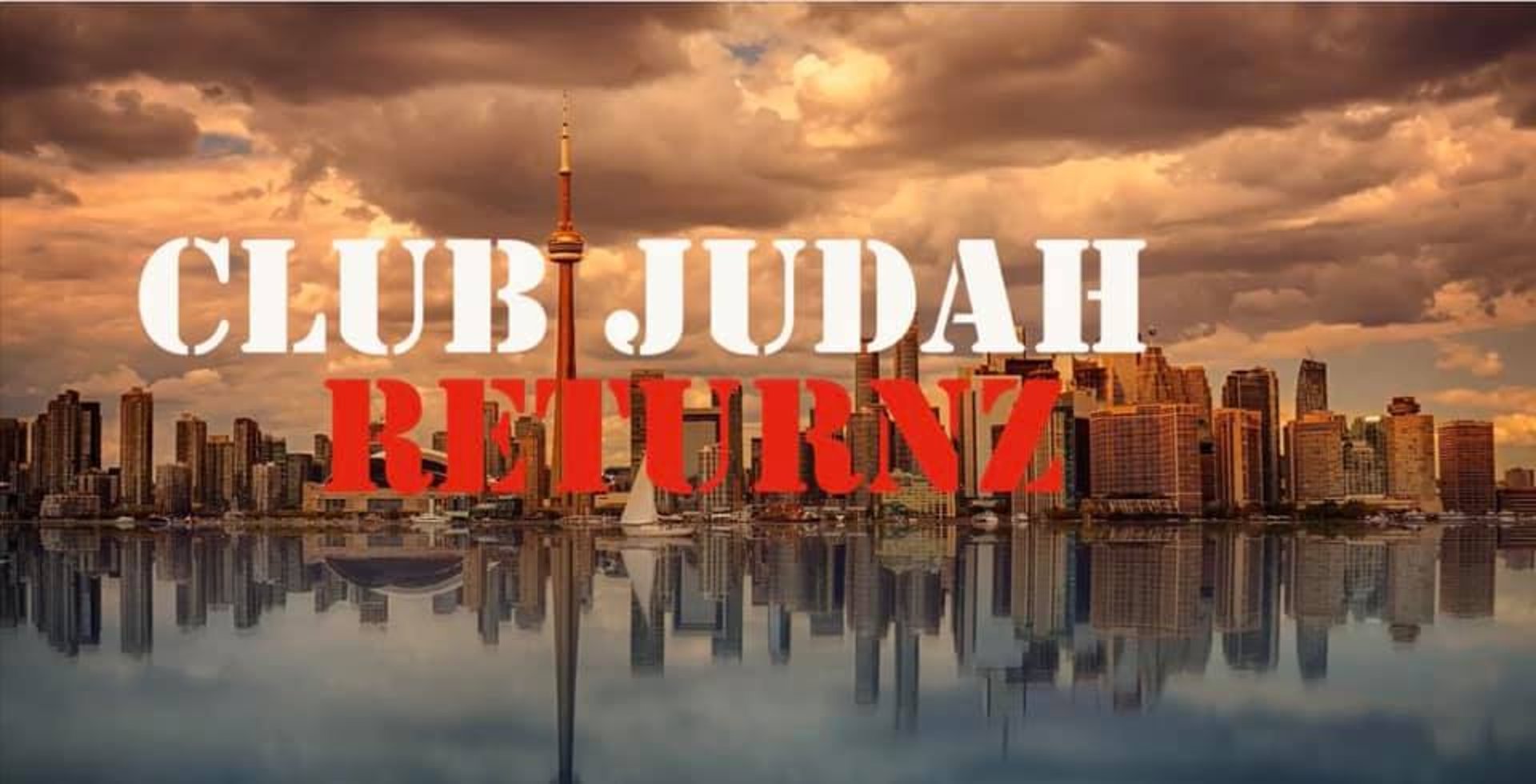 an abstract photo of a curved building with a blue sky in the background