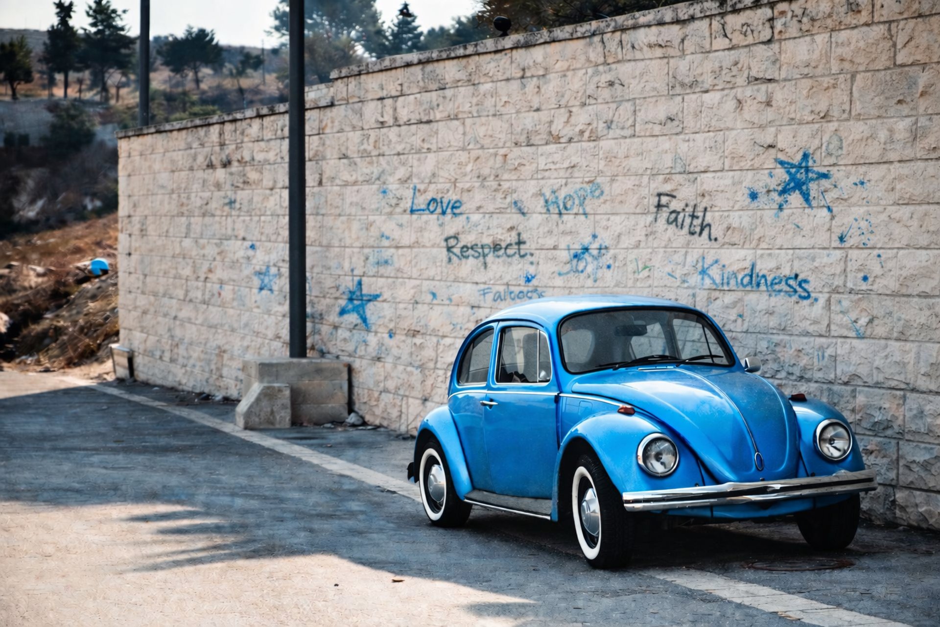 man in black jacket holding black video camera
