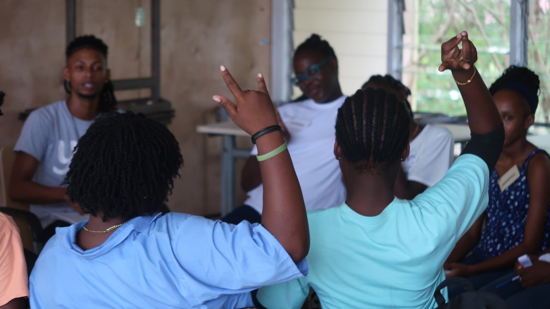 an abstract photo of a curved building with a blue sky in the background
