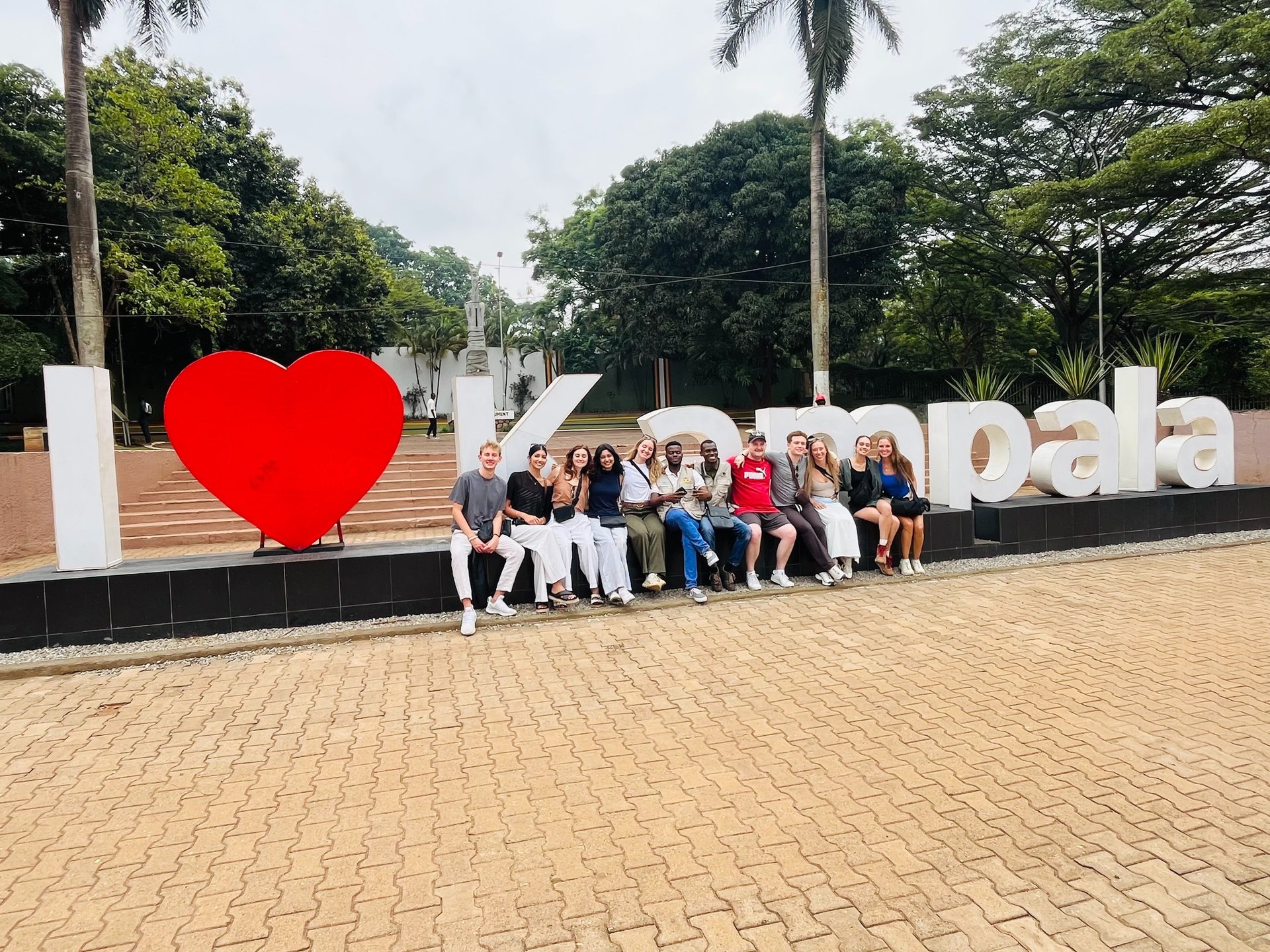 an abstract photo of a curved building with a blue sky in the background