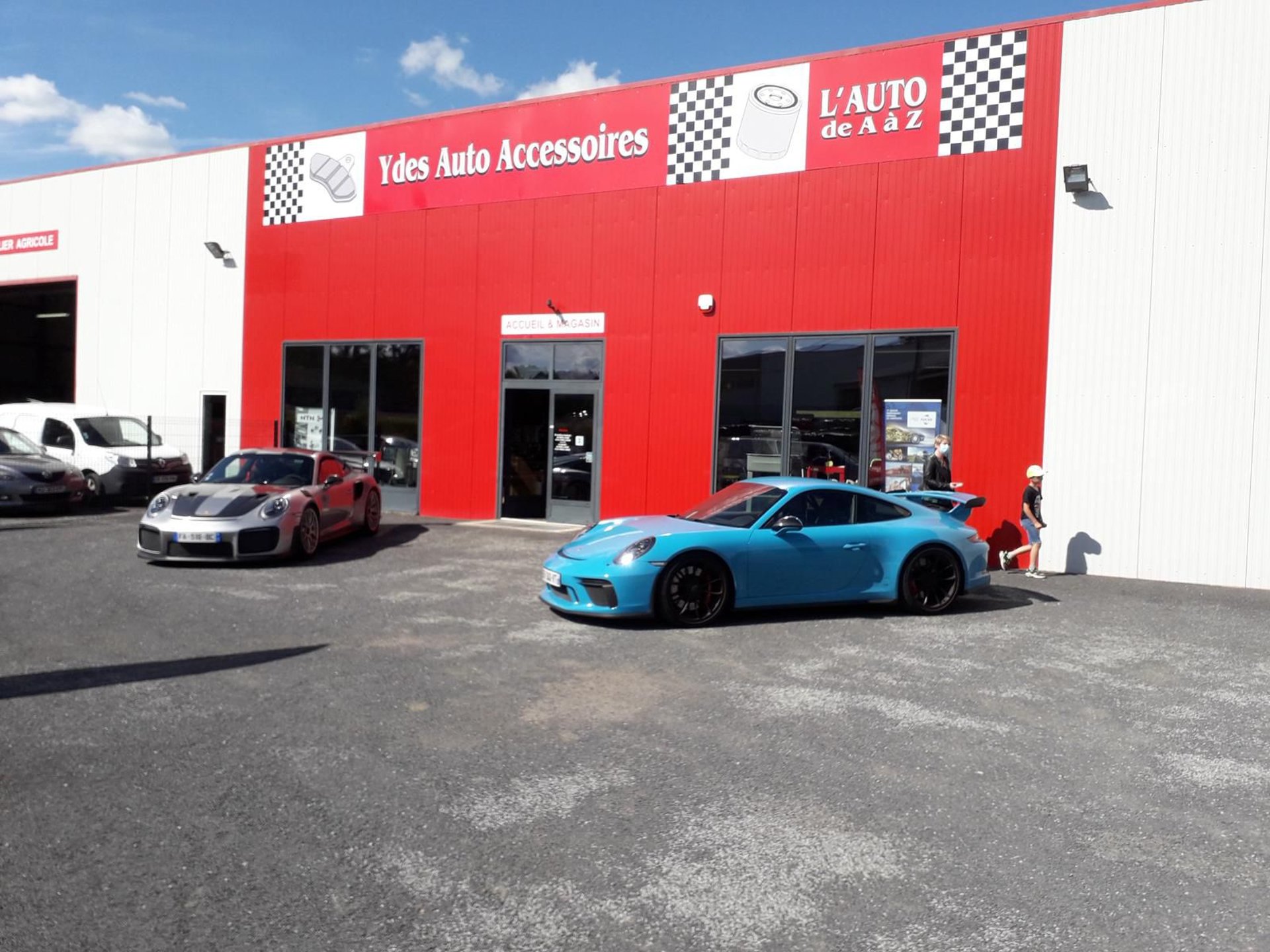 an abstract photo of a curved building with a blue sky in the background