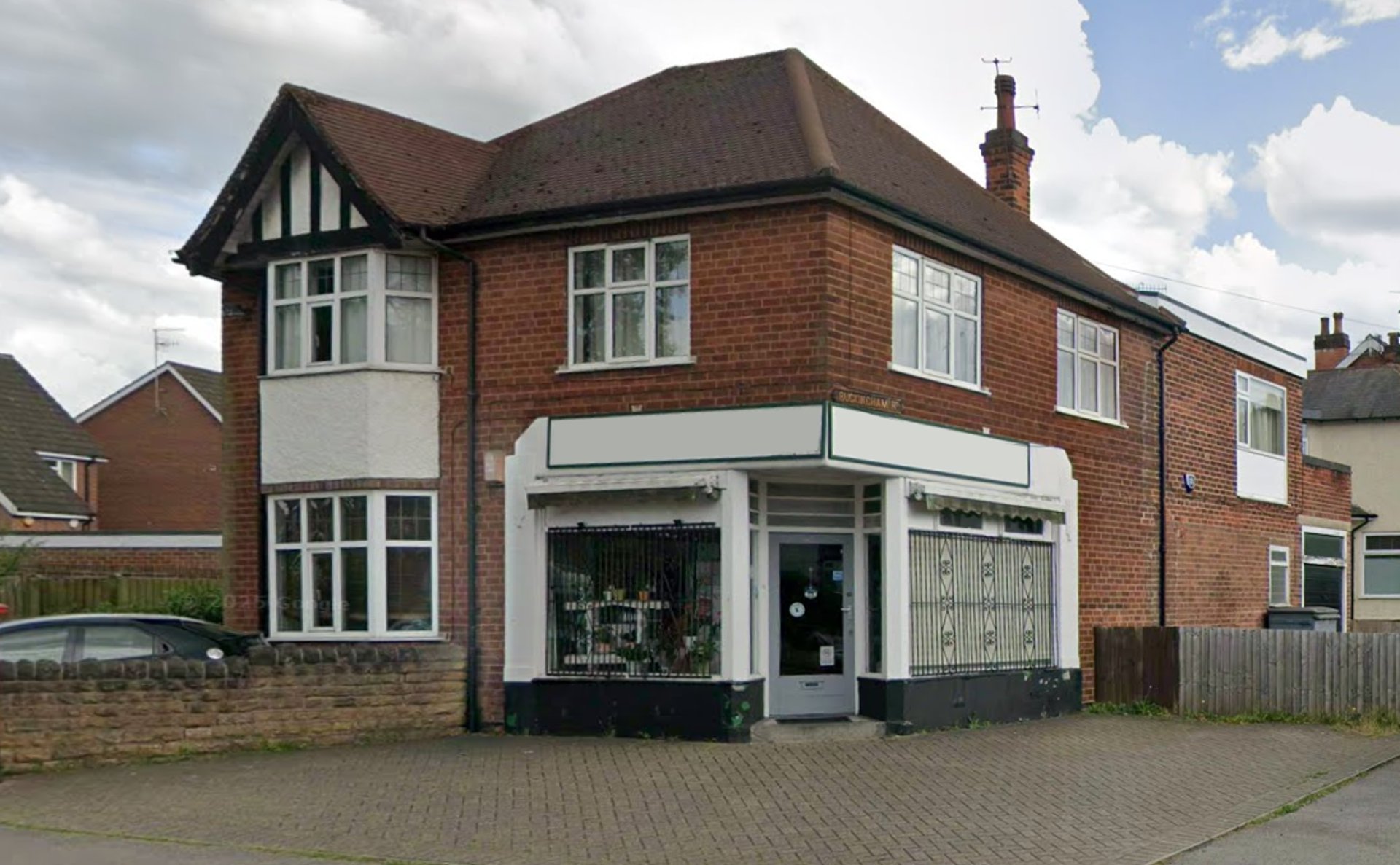 woman wearing yellow long-sleeved dress under white clouds and blue sky during daytime