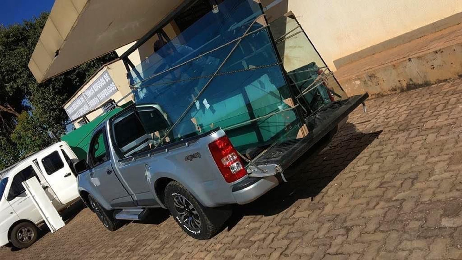 woman wearing yellow long-sleeved dress under white clouds and blue sky during daytime