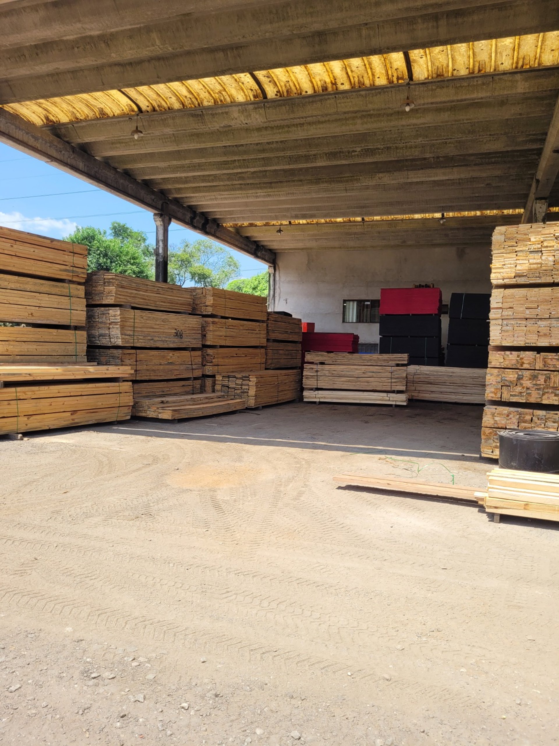 an abstract photo of a curved building with a blue sky in the background