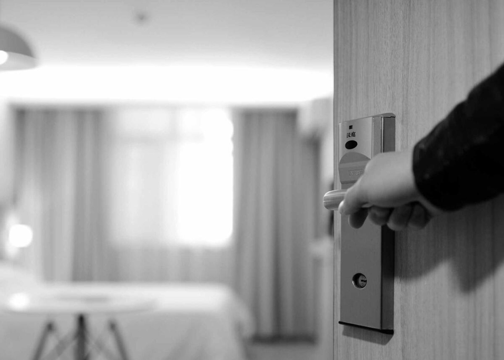 an abstract photo of a curved building with a blue sky in the background
