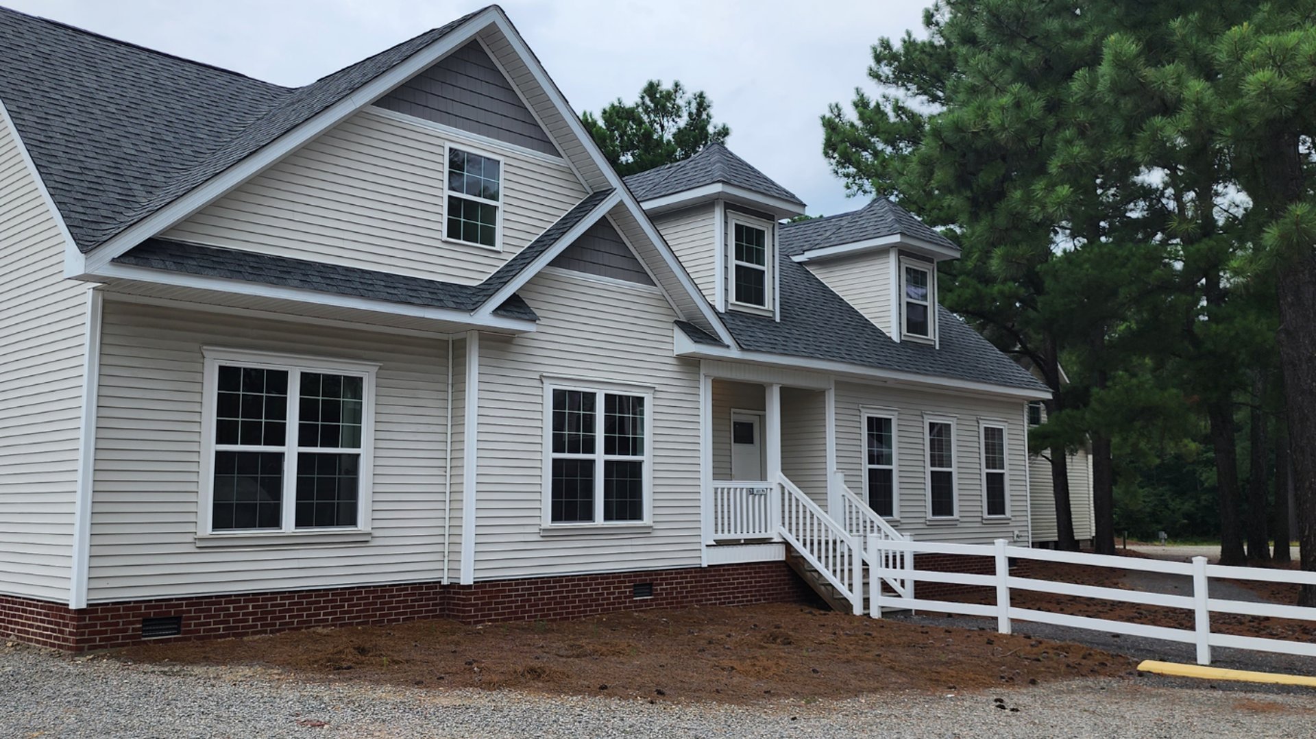 black and brown leather padded tub sofa